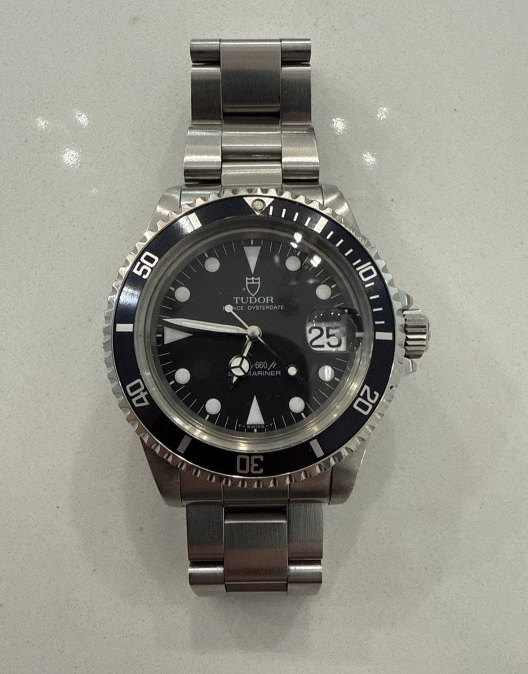 May be an image of wrist watch and text that says '50 5 TUDOR '