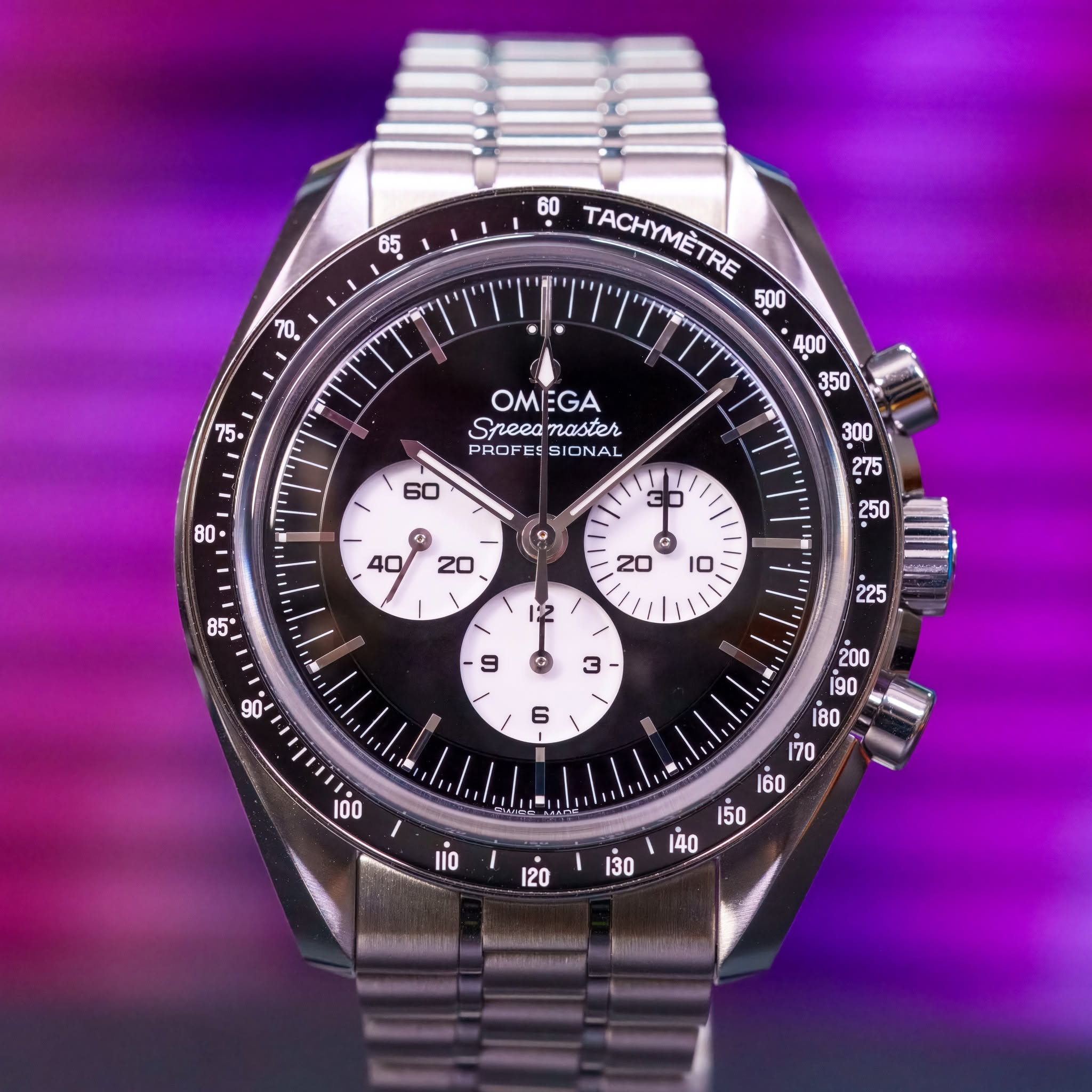 May be an image of wrist watch and text that says '65 70 60 TACHYMÈTRE जੇ OMEGA Sneea naster PROFES Speeanaster O ONAL a - ធុ G 20 10 12 ! ်ခ် G 9 Po 225 3 ane ی 6 + 00 ا 事A品…
