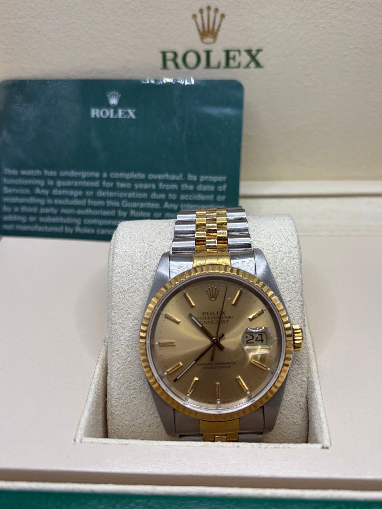 May be an image of wrist watch and text