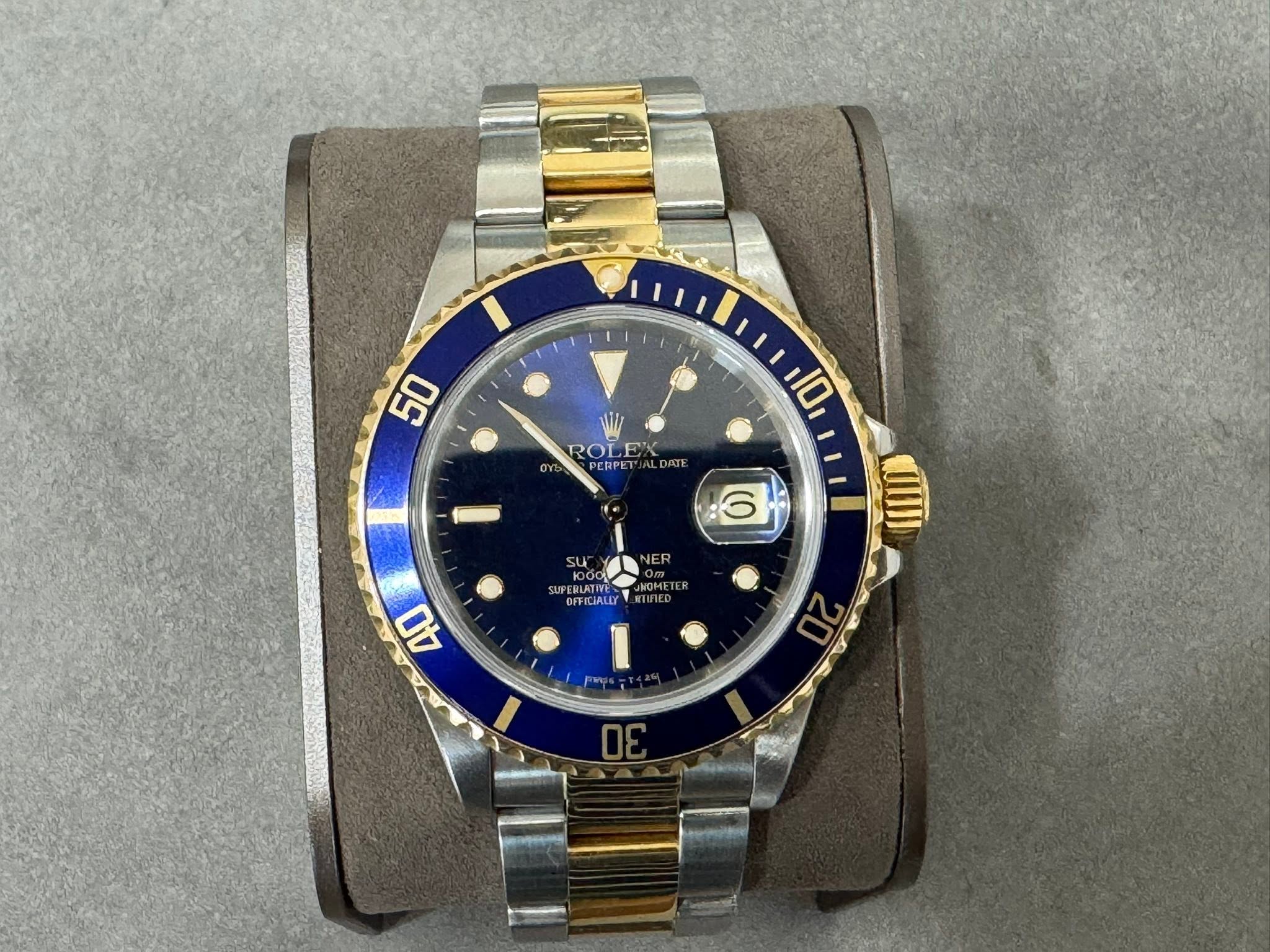 May be an image of wrist watch and text that says '50 10 ROLEX DATE ROI ROLEX ERPE SA 6 SUPERLATIVE '