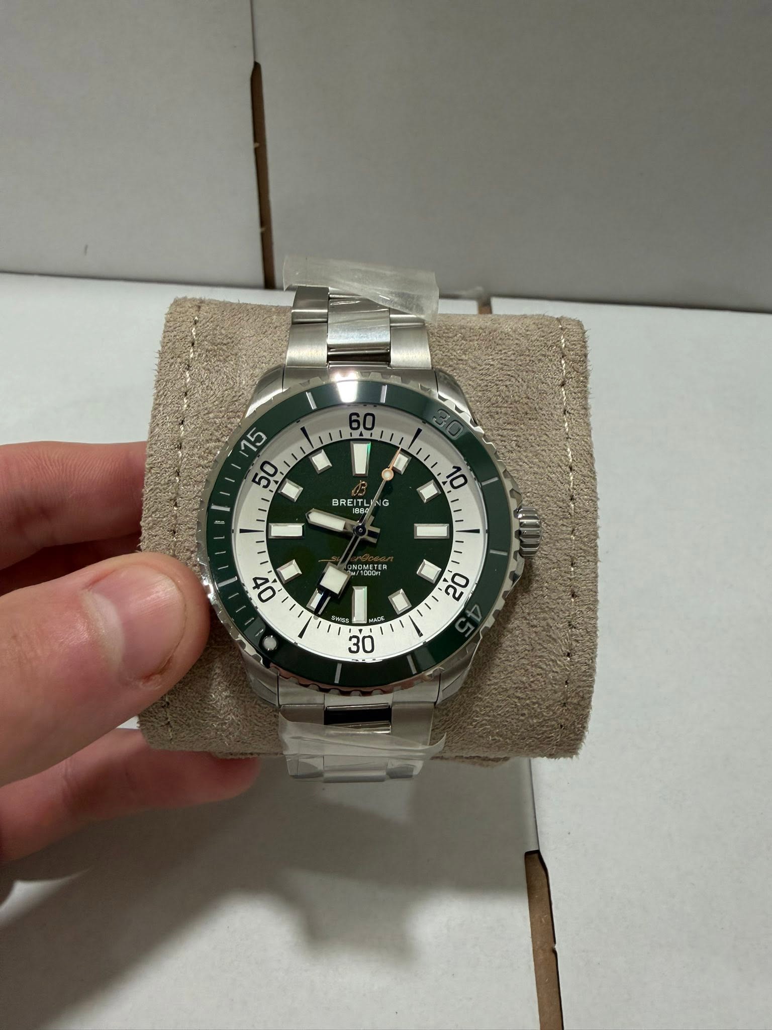 May be an image of wrist watch and text