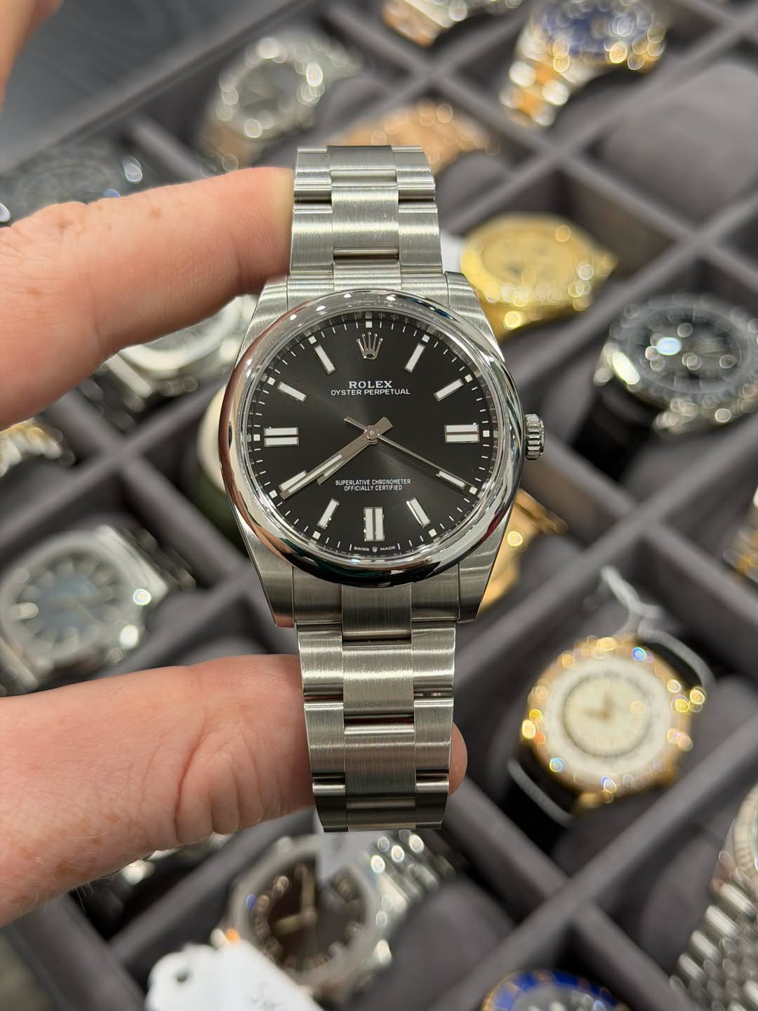 May be an image of wrist watch and text