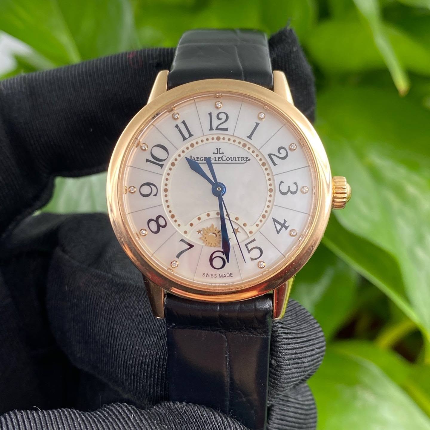 May be an image of wrist watch and text