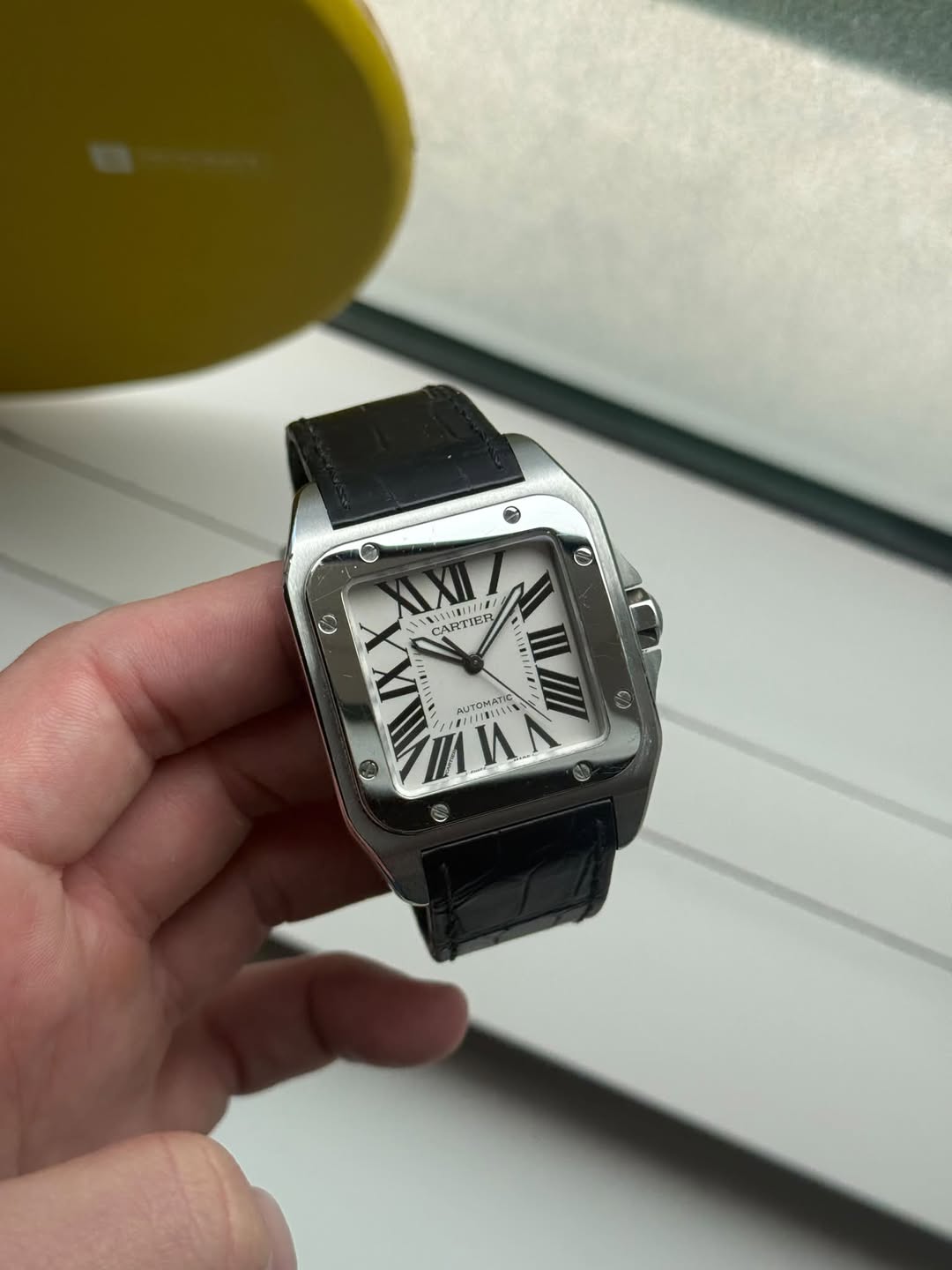 May be an image of digital watch and text