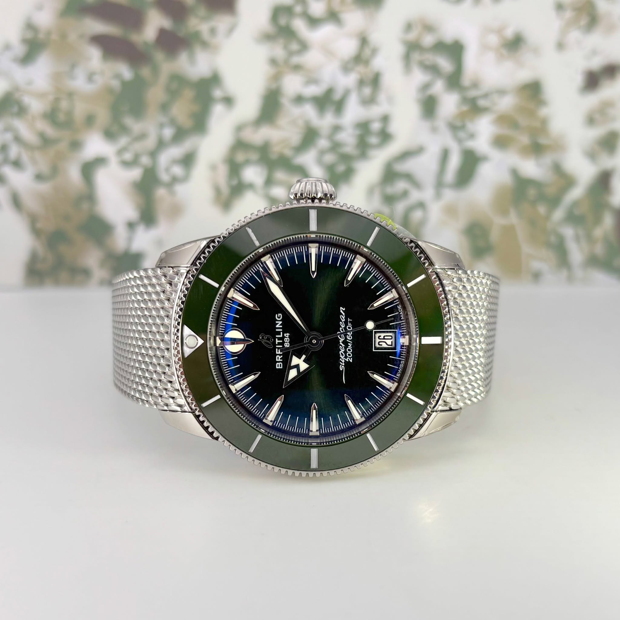 May be an image of wrist watch and text