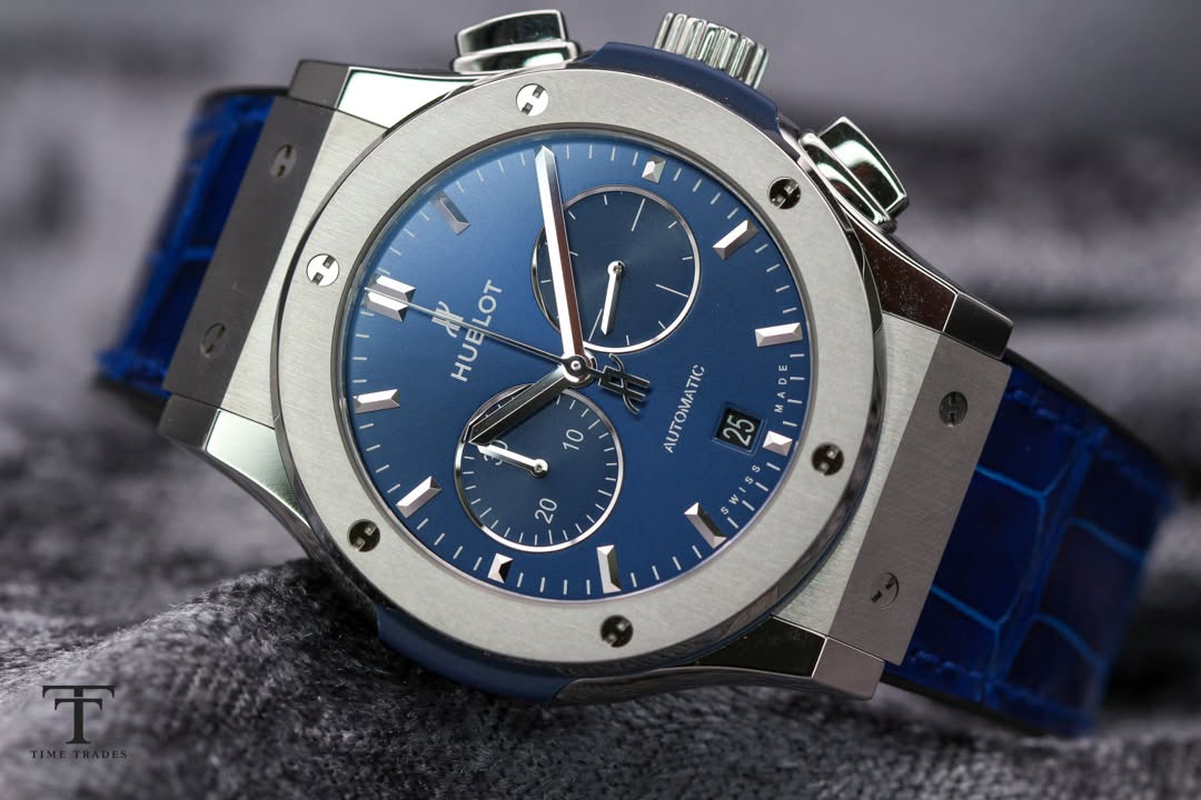 May be an image of wrist watch and text that says 'អអន០ C dP HUELOT Yo 10 AUTOMATIC TIC ۱۱۱ 25 20 0 ጥ'