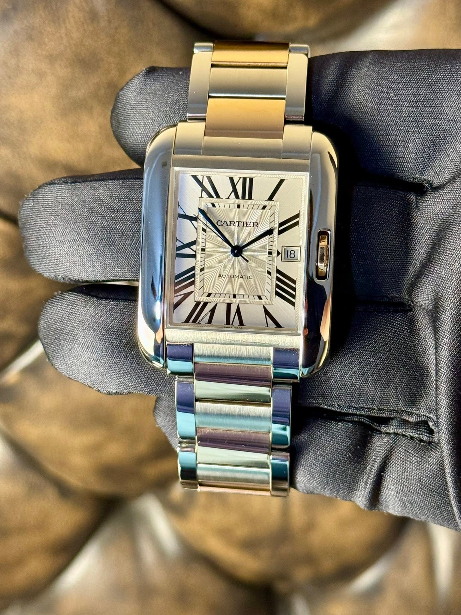 May be an image of wrist watch and text