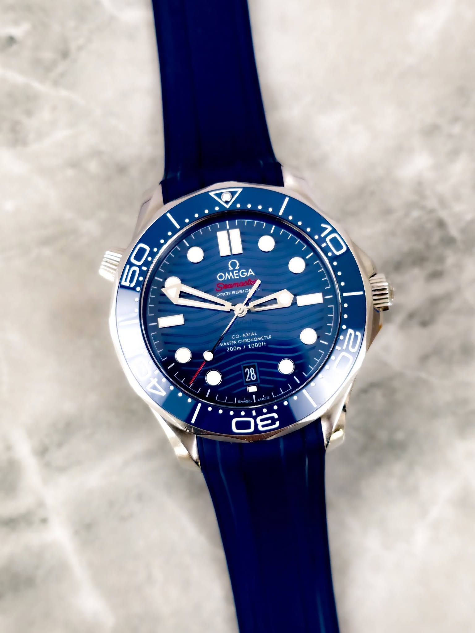 May be an image of wrist watch and text that says '50 ن II OMEGA Ω PROPSSSI PROr 四. 2IO 10 CO-AXIAL CO-AMAL TERCHEONOM coeu TER MAST 1000t 1000ft 300m 2 4 2 구 28 ማ B. د'