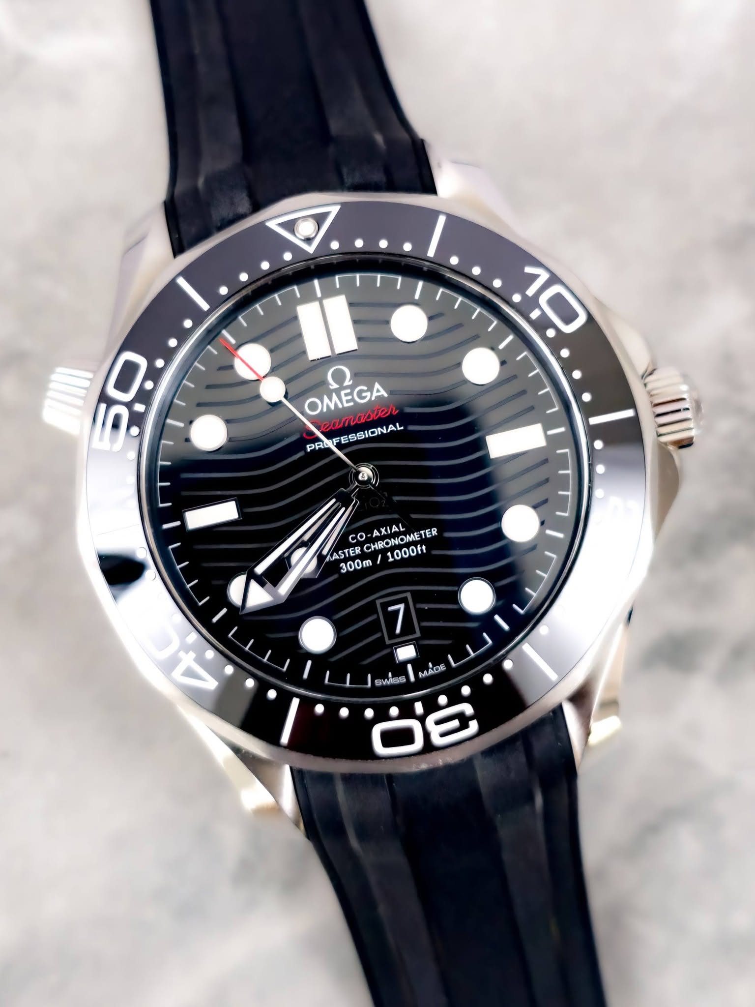 May be an image of wrist watch and text that says 'لا 10 MINI 50 OMEGA س KBaTablйл eaTaA PRE FESSIONAL co AXIAL HRONOM TER ASTER CHRONOMETER 300m 1000ft 入、 ل 4C 4 7 wwss M:…