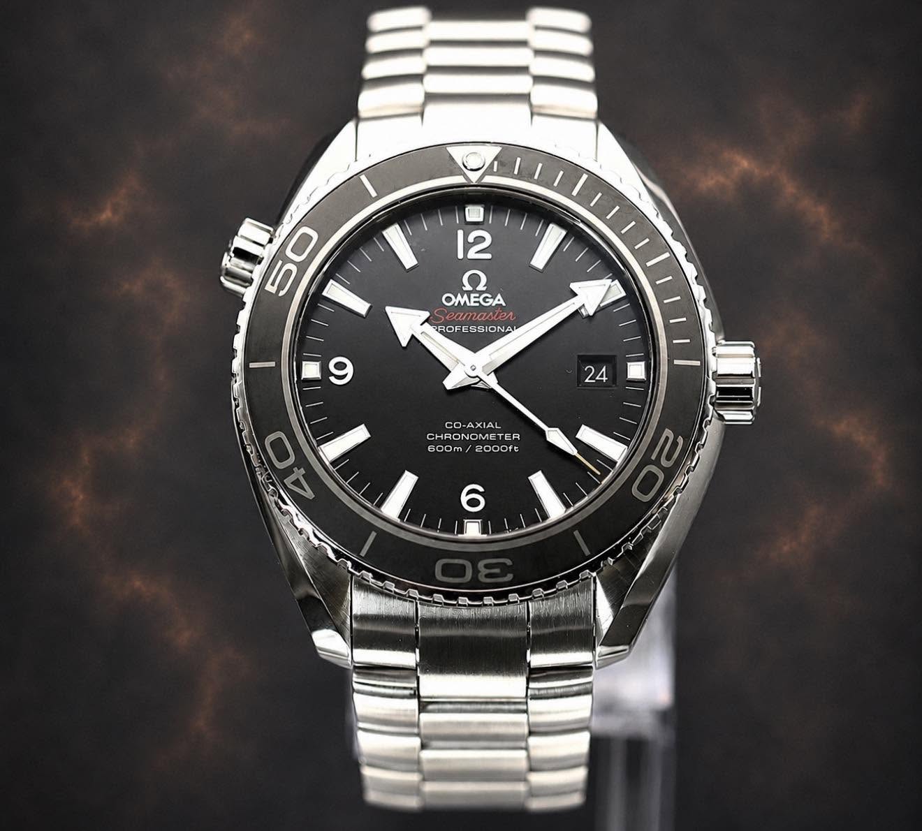 May be an image of wrist watch and text that says '50 م 12 l' OMEGA PROFESS ONAI 9 24 CO-AXIAL HRONO CHA OMETER ER BDDm 2000ft r 40 4 م 6 ח'