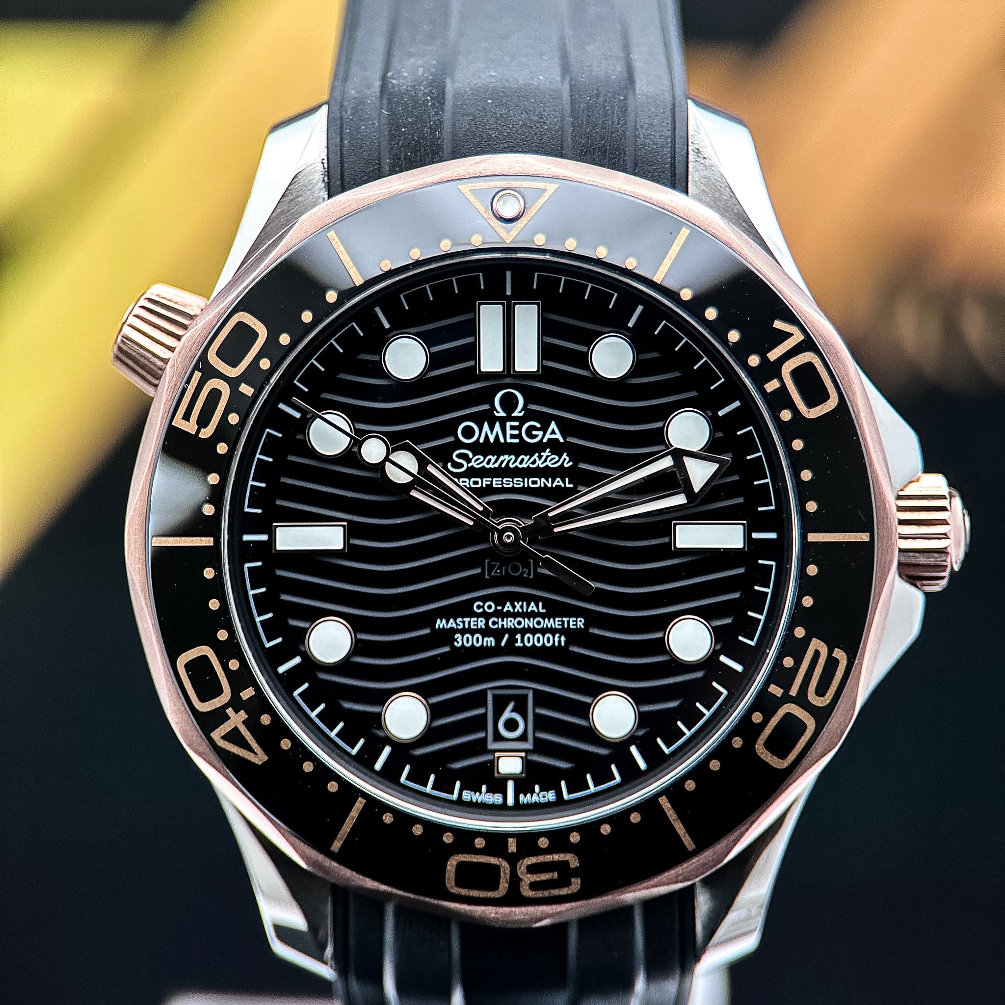 May be an image of wrist watch and text that says '2 OMEGA Seamaster ROFESSIONAL 景 場 للا 果 I لس co MASTER CHRONOMETER MASTERCHOMOMETER ETER 300m /1 1000ft ● B A AC6 لا'