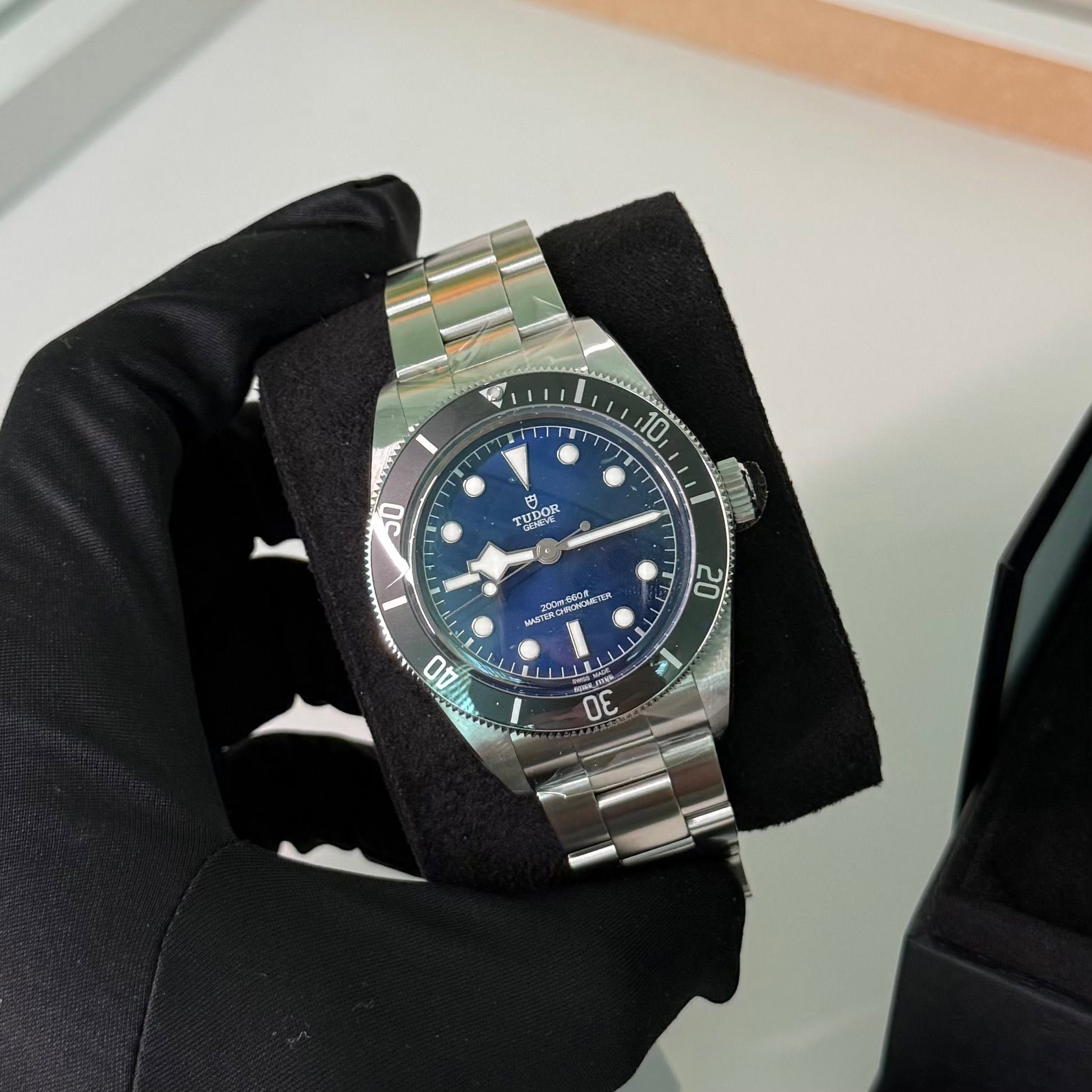 May be an image of wrist watch and text