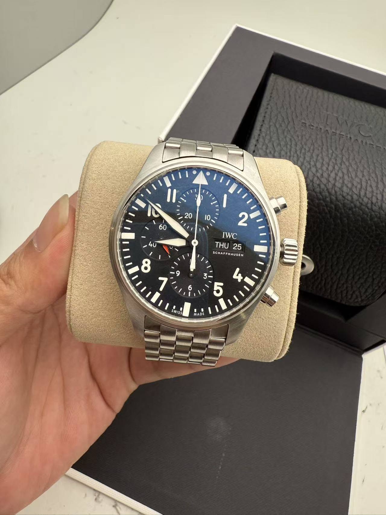 May be an image of wrist watch and text