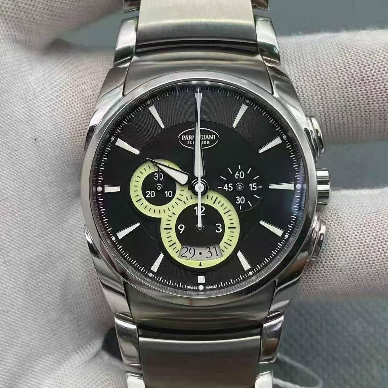 May be an image of wrist watch and text