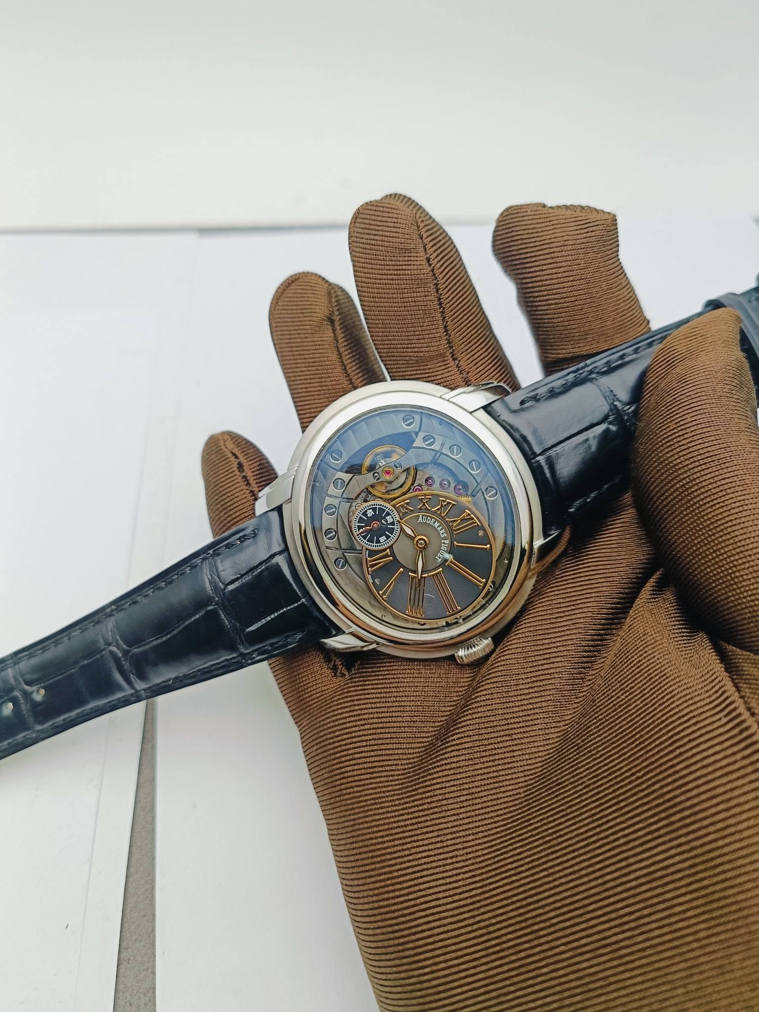 May be an image of wrist watch and text