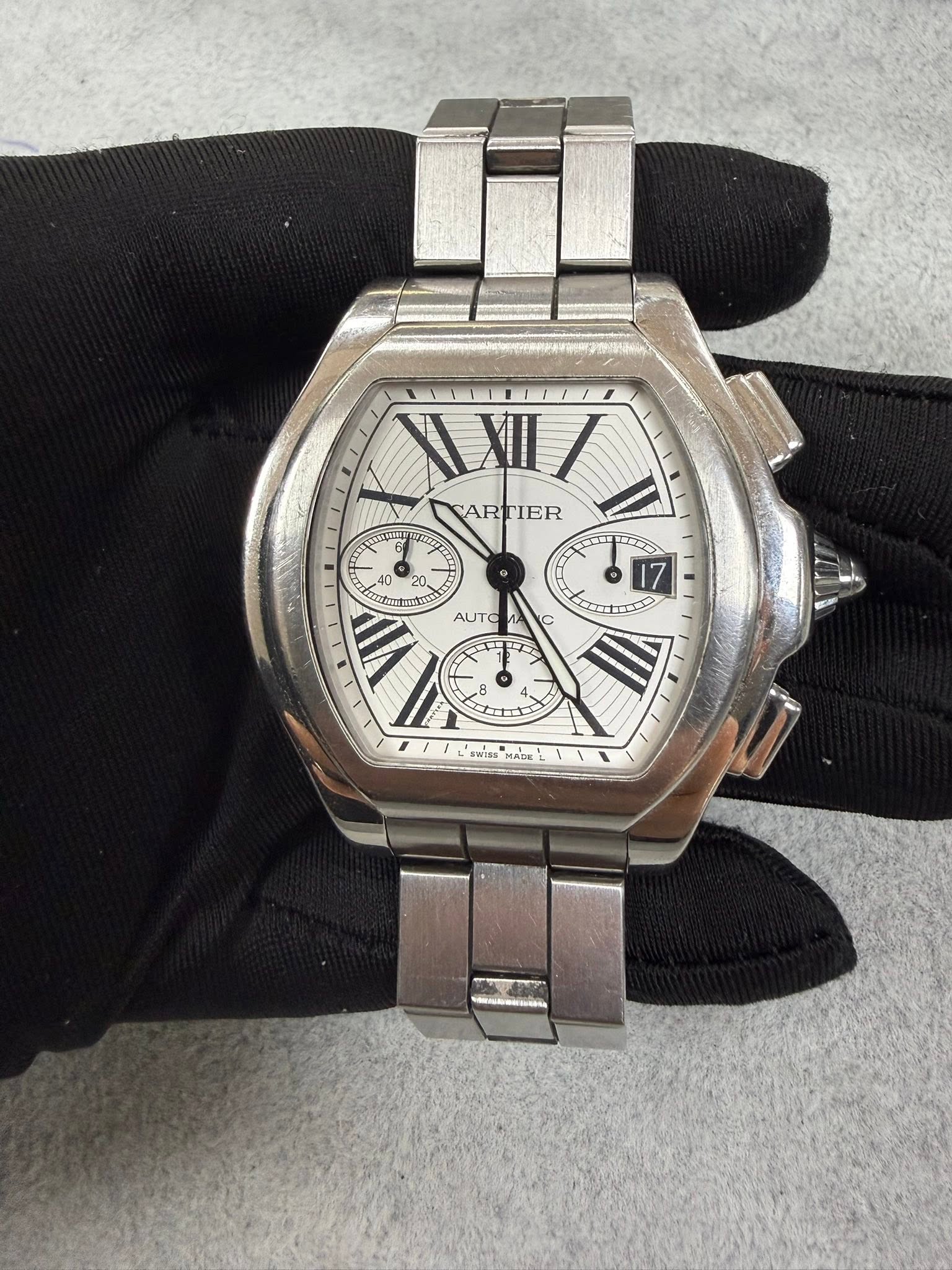 May be an image of digital watch and text