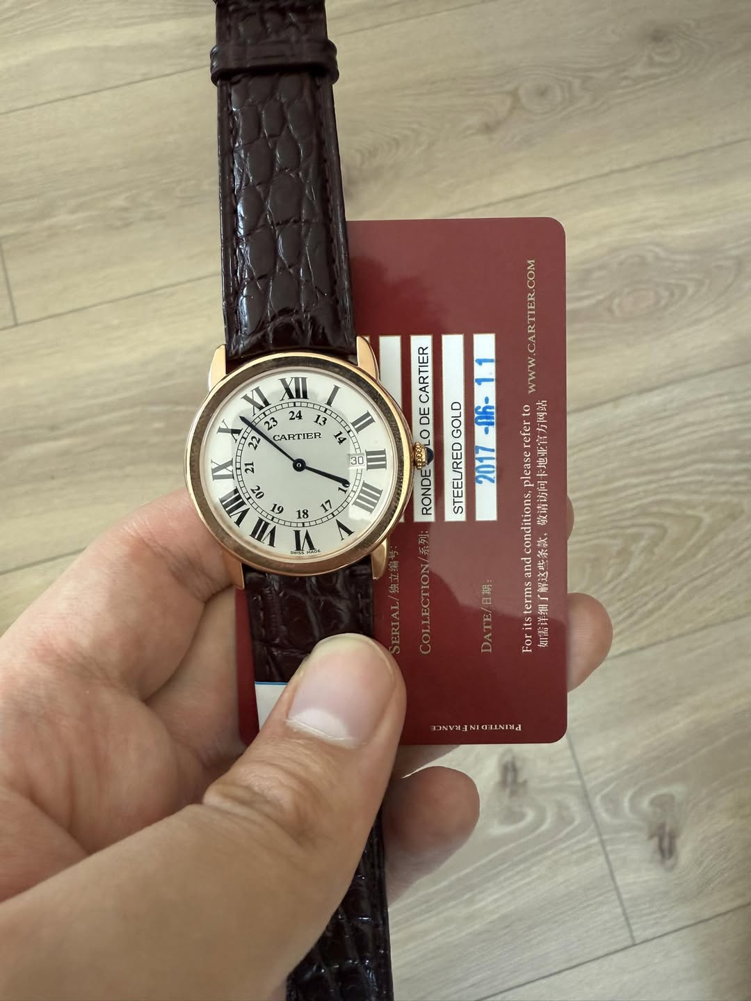 May be an image of leather, digital watch and text that says 'Π XII 23 13 CPTEEH II 임디 1 21 VII VII ی Tr CARTIER LODE GOLD pleasereferto 卡地亚官方网語 RONDE STEELRED 2017 conditions…