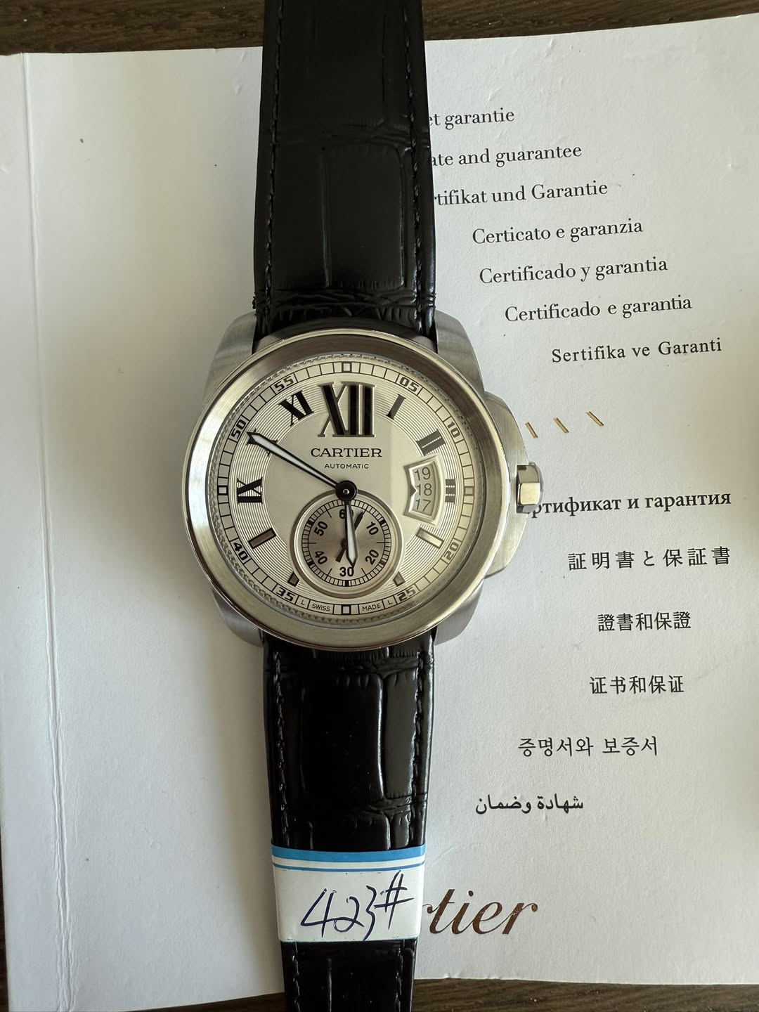 May be an image of wrist watch and text that says 'ct garantie ate and guarantce tifikat und Garantie Certicato e garanzia Certificado y garantia Certificado e garantia…