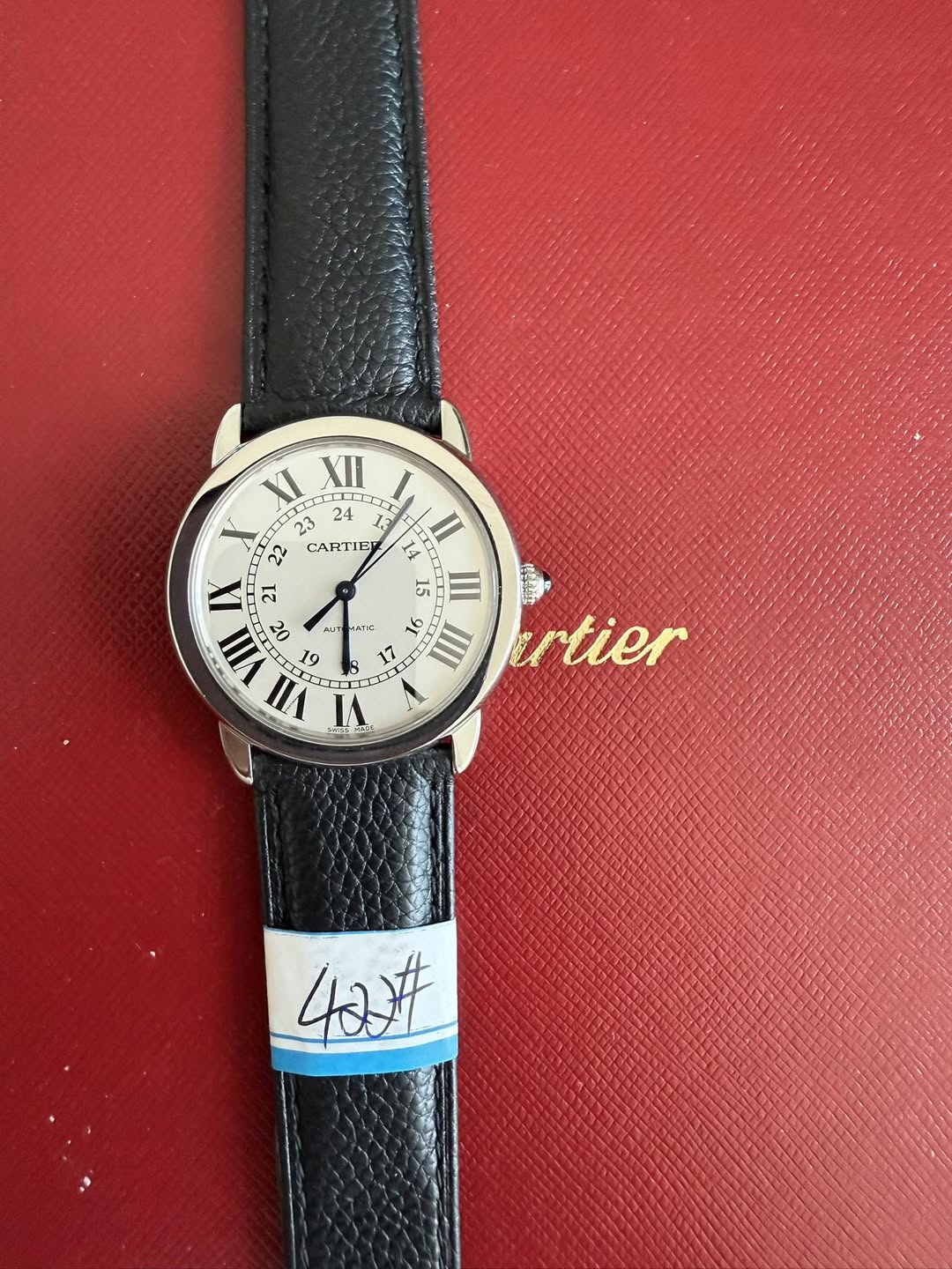 May be an image of wrist watch, leather and text that says 'XI CL 23 24 T XII 1.3 7= กใน CARTIE 14 14 14 II 21 21 15 III VIII o2 AUT ه 10 । b 1 4 VII V ATE S 你4 tier 40'