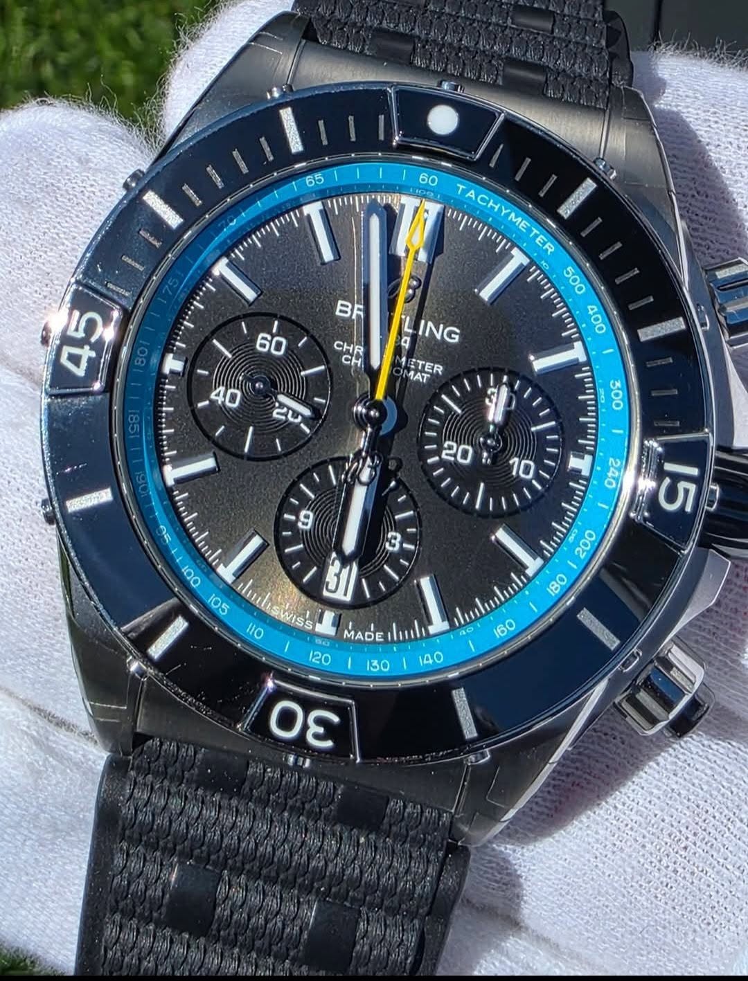 May be an image of wrist watch and text