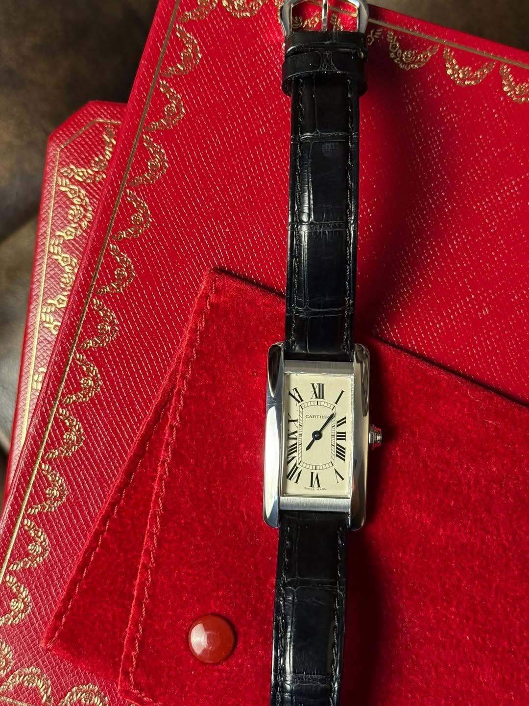 May be an image of leather and wrist watch