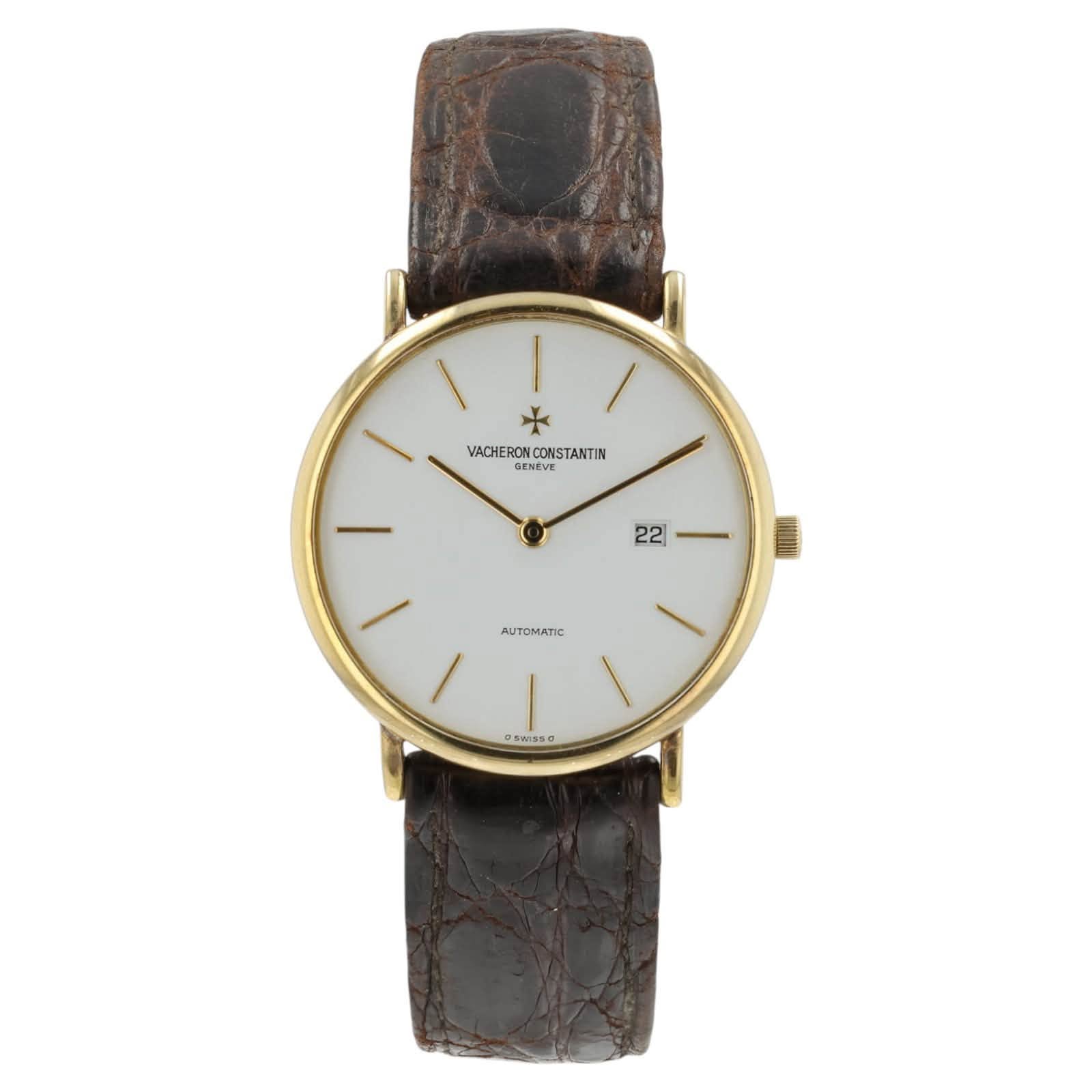 May be an image of leather, wrist watch and text that says 'ACHER VACHERON.CONSTANTIN ONC CONSTANTIN GENEVE 22 AUTOMATIC ١ CSWISSO'