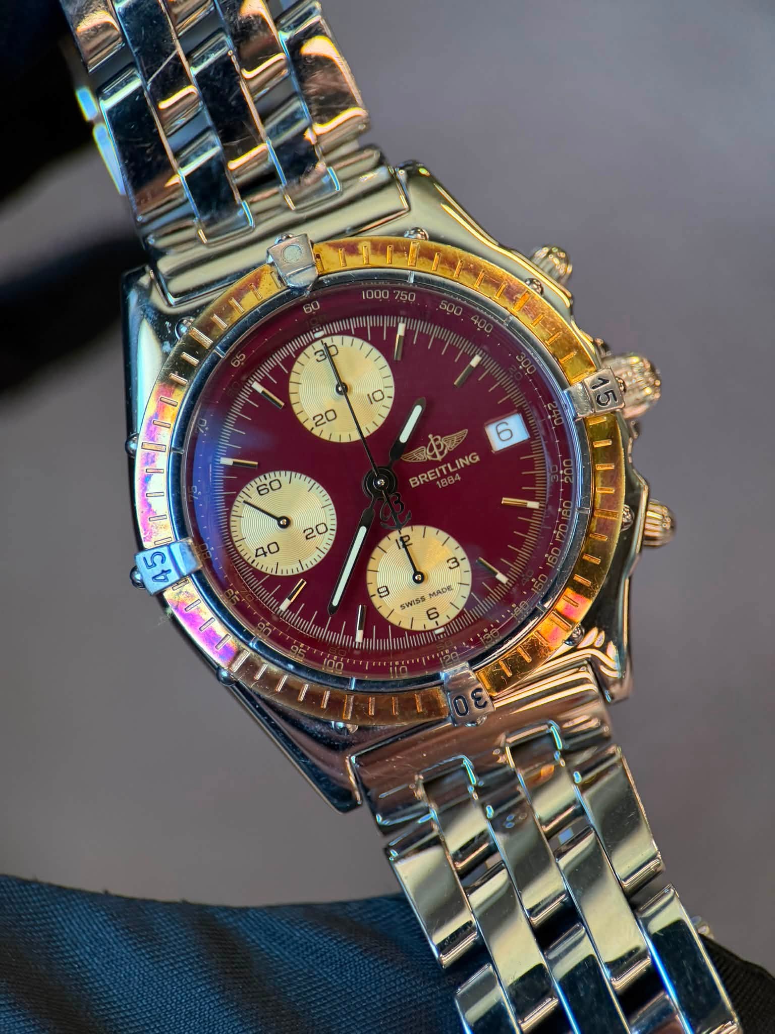 May be an image of wrist watch and text that says '1000750 3b 10 20 60 u 6 BREITLING ING 40 20 لم P 45 t LLI 3 9 a MADE SWISS 60'
