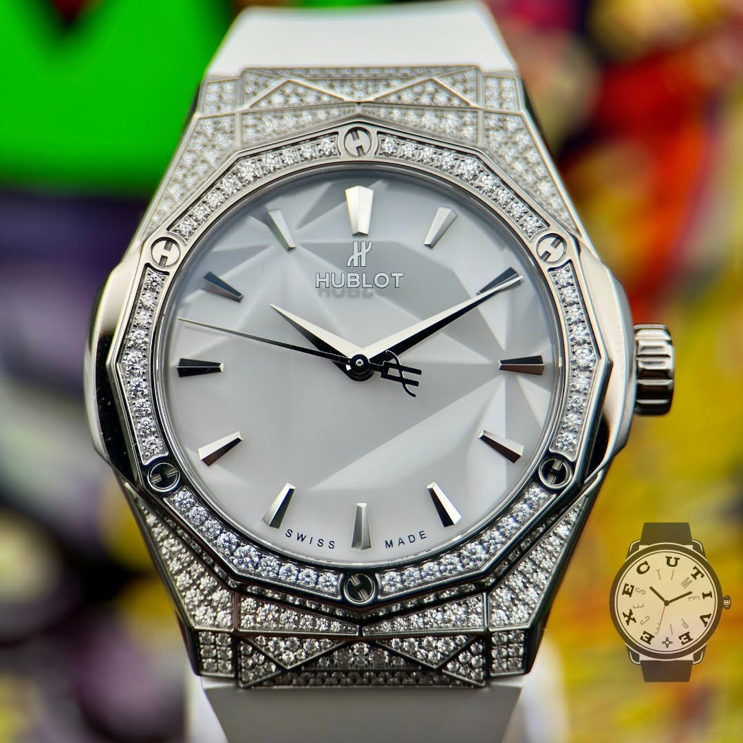 May be an image of wrist watch and text
