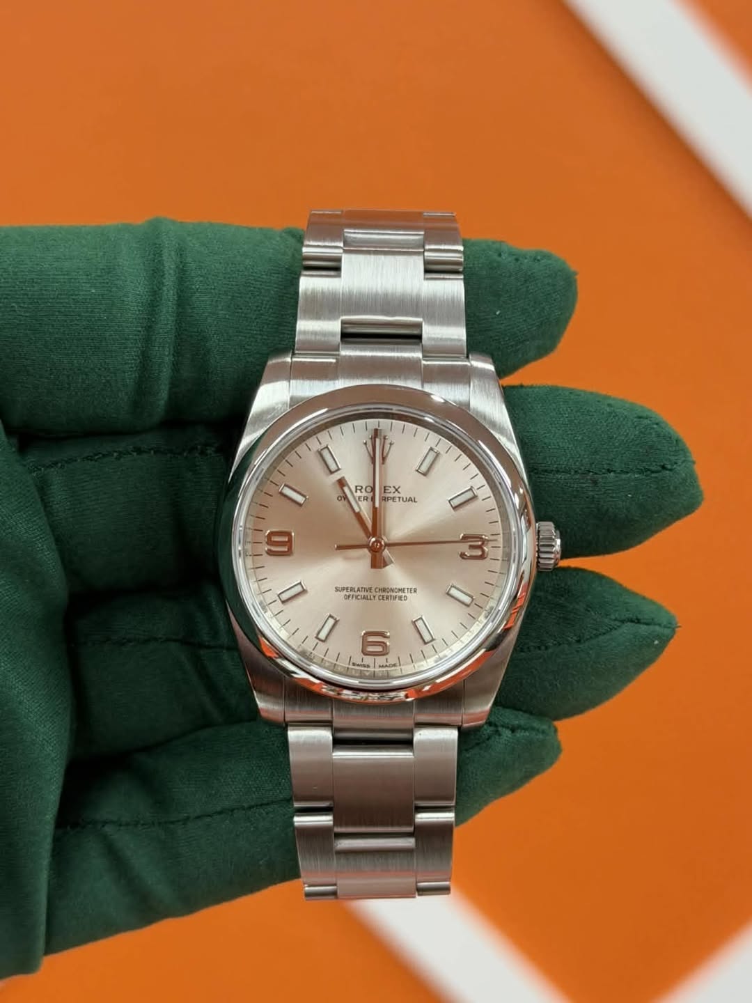 May be an image of wrist watch and text