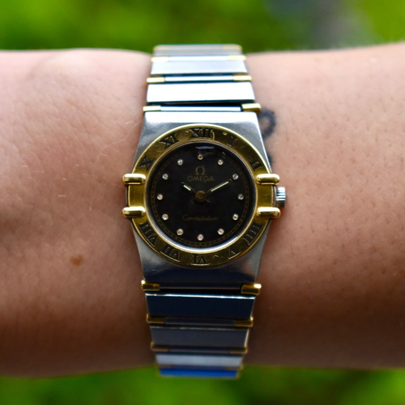 May be an image of wrist watch