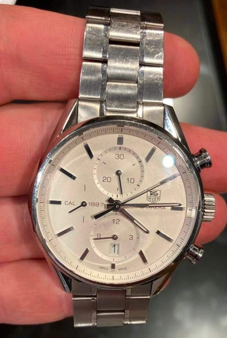 May be an image of wrist watch and text that says '30 20 10 CAL 1887 KG METER ATTERA A KEIO SWISS MADE'