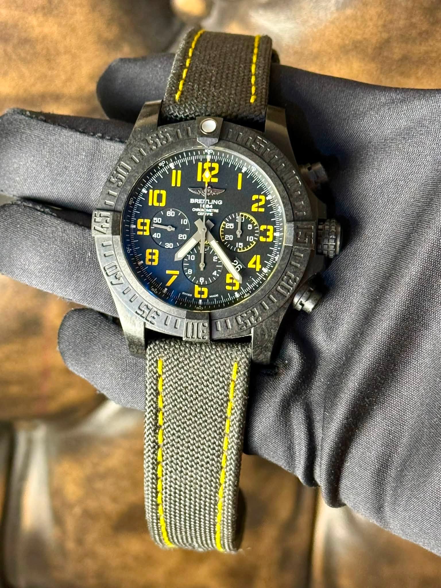 May be an image of wrist watch and text