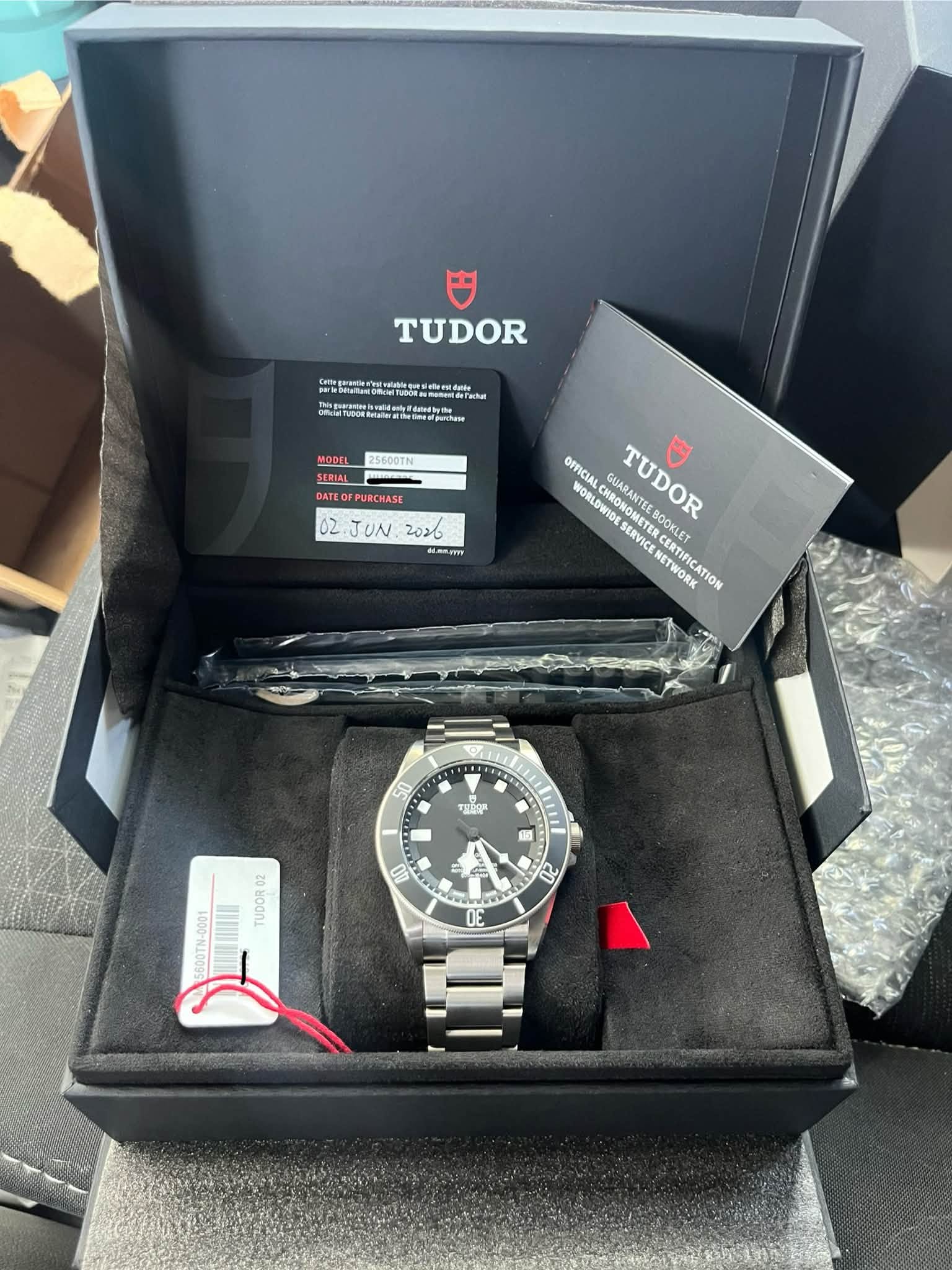 May be an image of wrist watch and text that says 'TUDOR ( MODEL SERIAL 25400TN DATEO PURCHASE JUN 2026 AT OFFICIA ORENORO CHRONTEE GUARANTE TUDOR ORLSYOROM WORLOWIDE SERVICE…