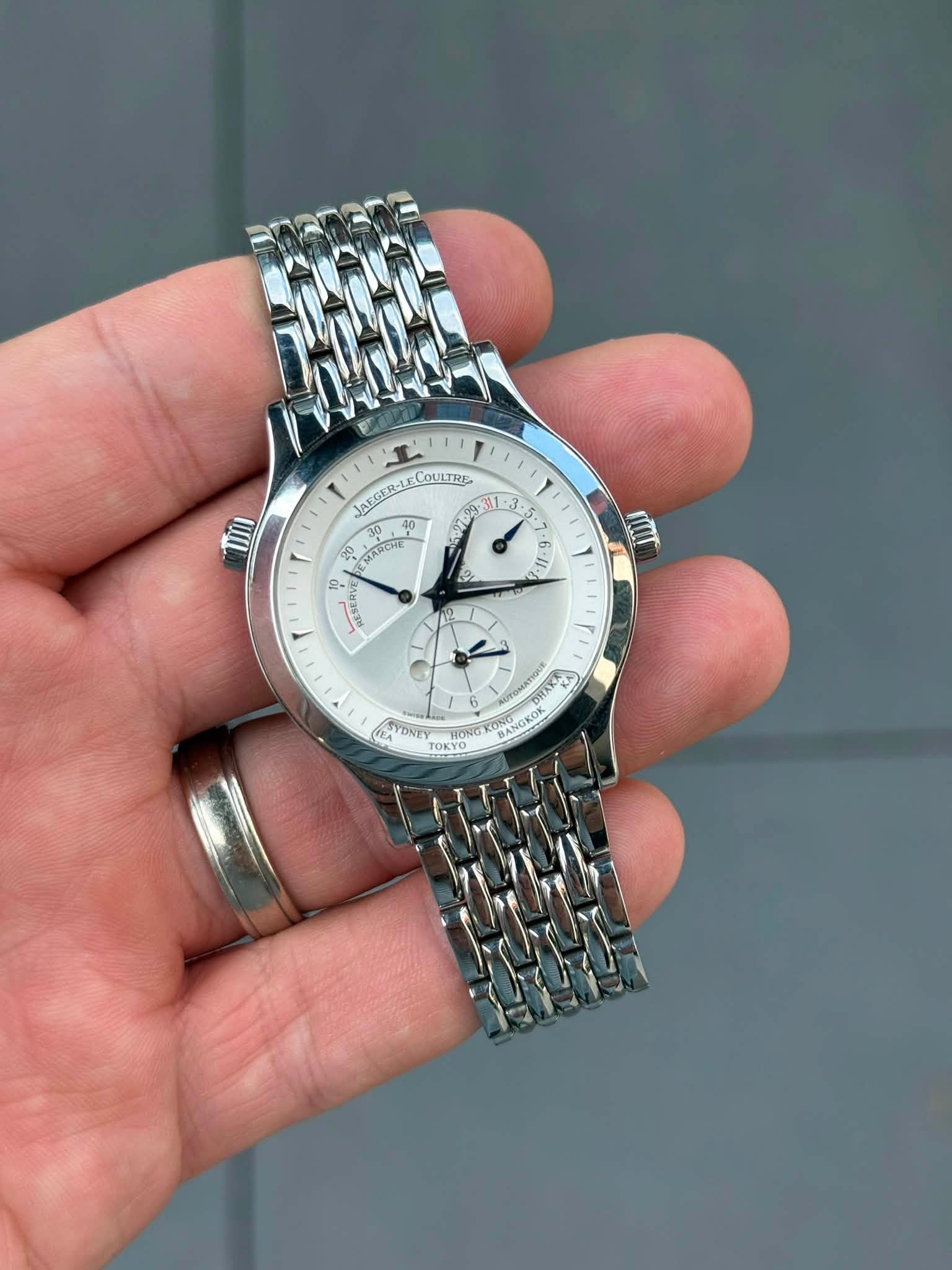 May be an image of wrist watch and text