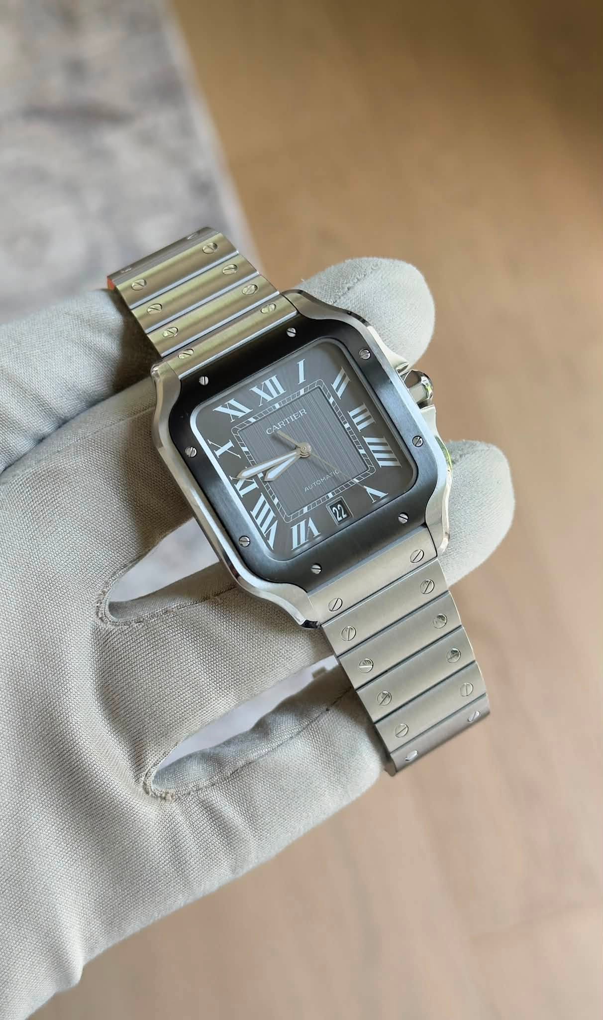 May be an image of digital watch and text that says 'C 마 G XII CARTIER 5 3 E II Ο L VIII 4 22 F 0 D D ٢ D ب'