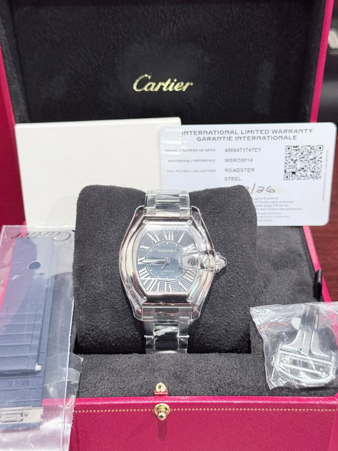 May be an image of wrist watch and text