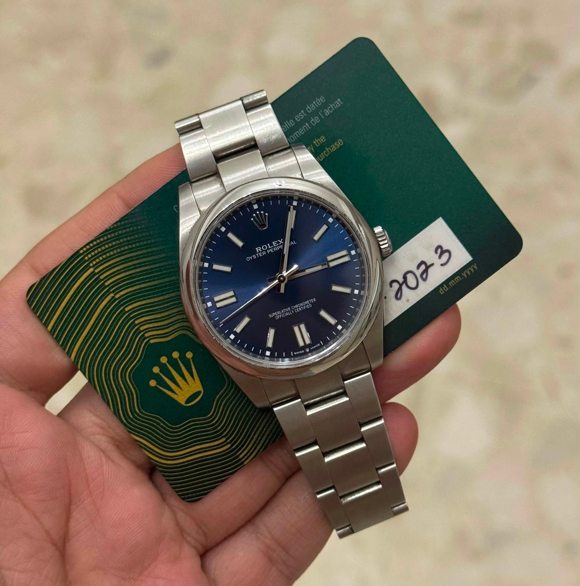 May be an image of wrist watch and text that says '11. I R ROLEX RAEX I #m '