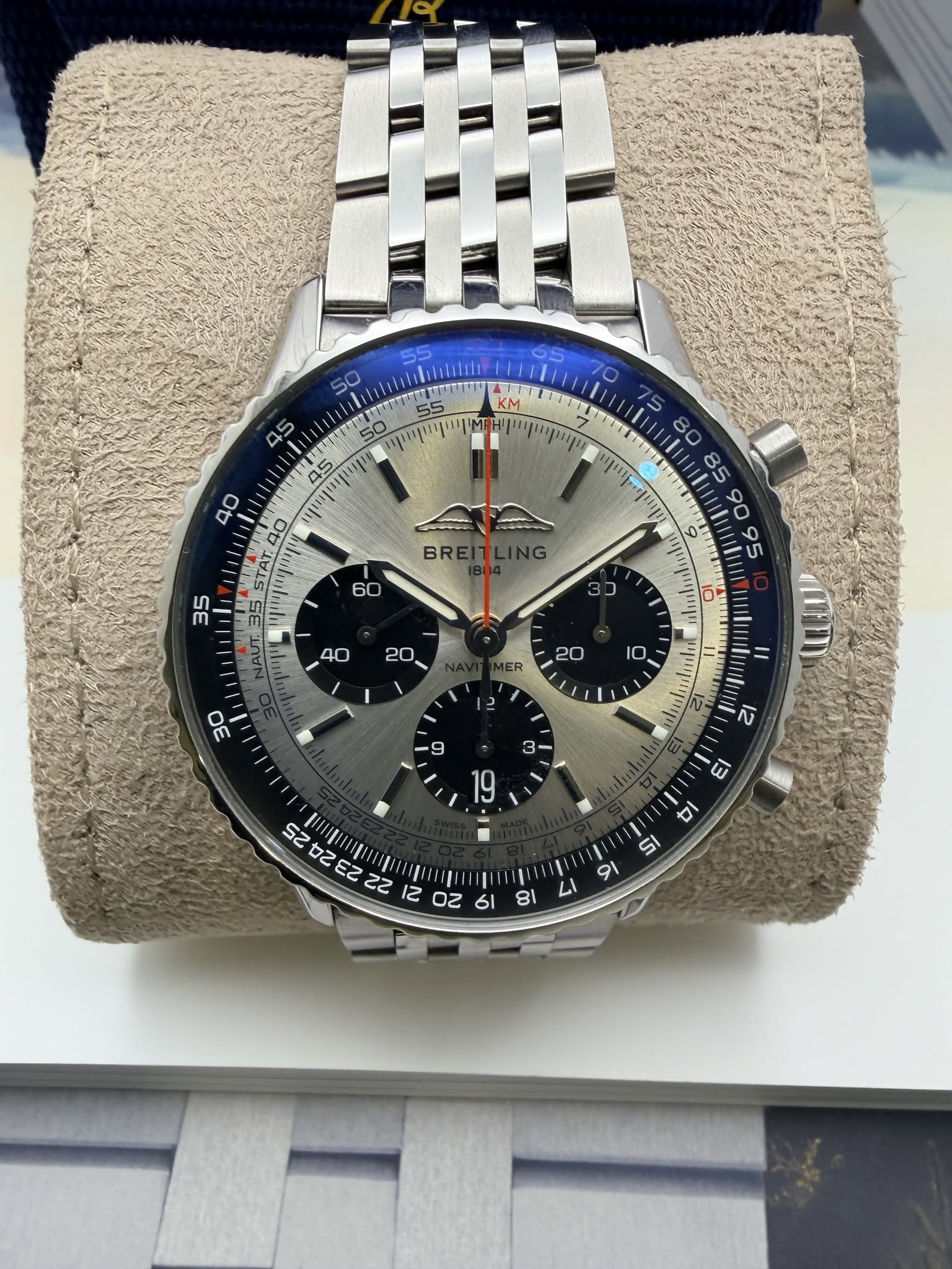 May be an image of wrist watch and text