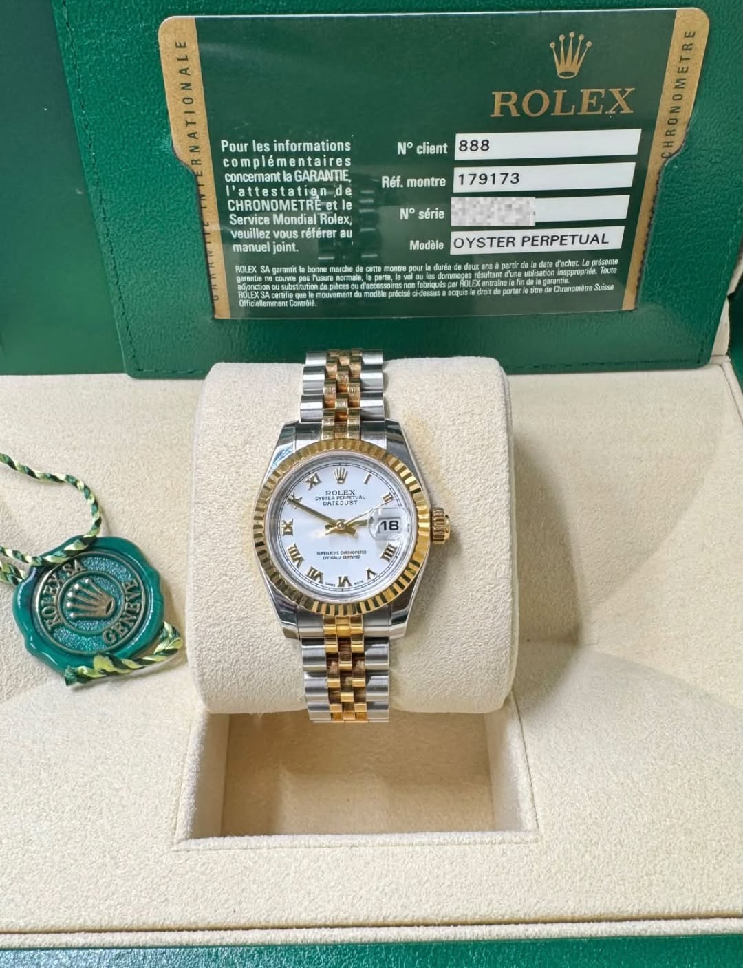 May be an image of wrist watch and text that says 'AA Pour les informations complémentaires mentaires concemanta mantlaGARANTIE GARANTIE N client 888 Réf. montre 179173 ROLEX CHRON…