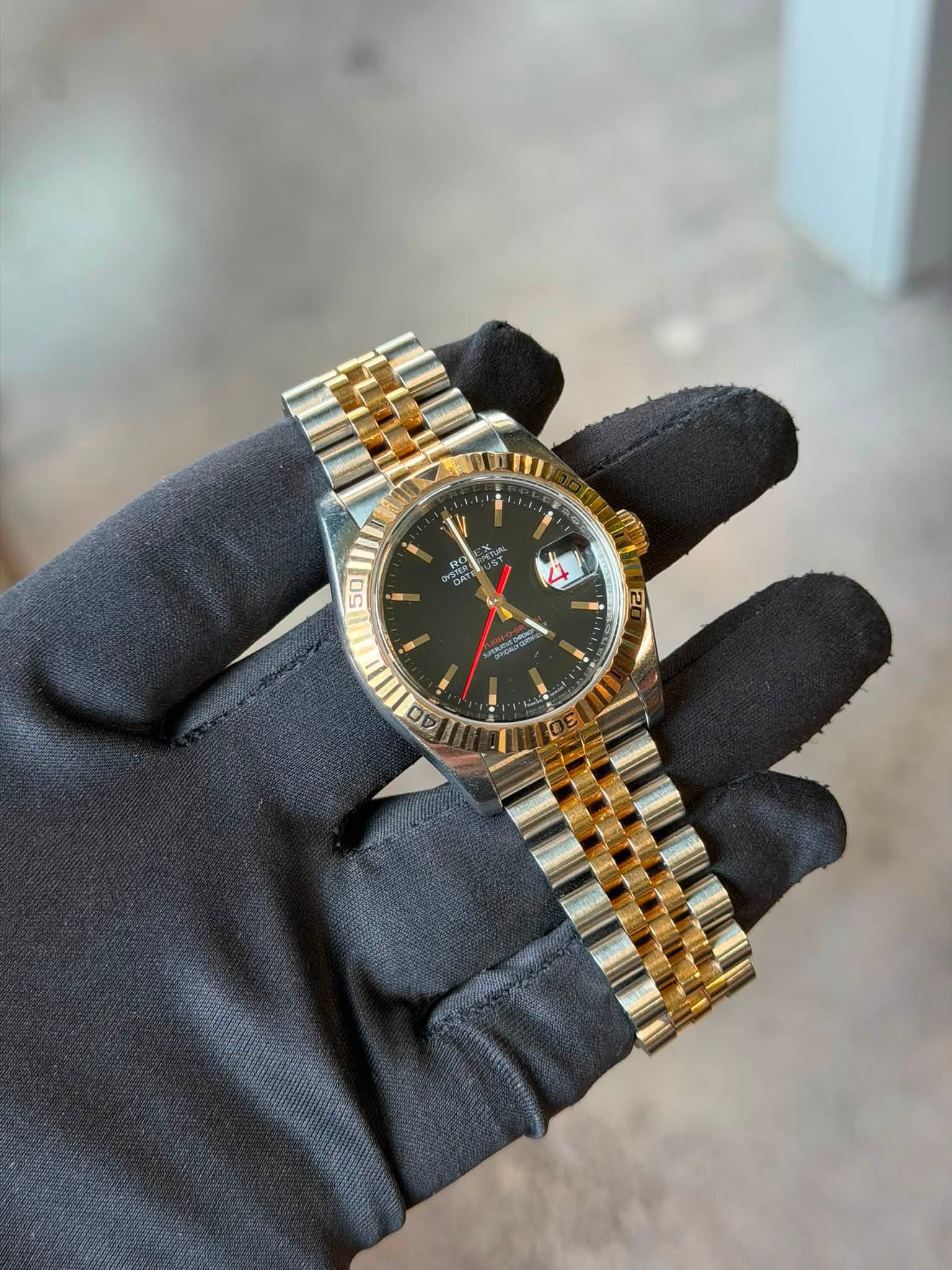 May be an image of wrist watch