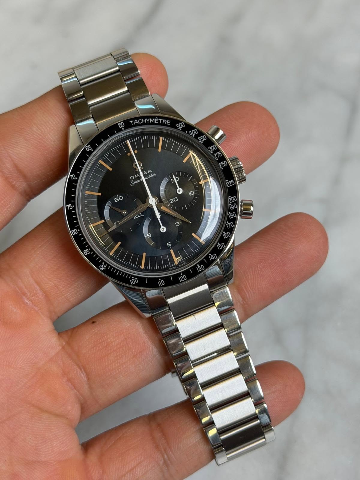 May be an image of wrist watch and text that says 'TACHYMET TRE 05 を I' 10 GA GA มรย addet ON yu たに、 l 80 10'