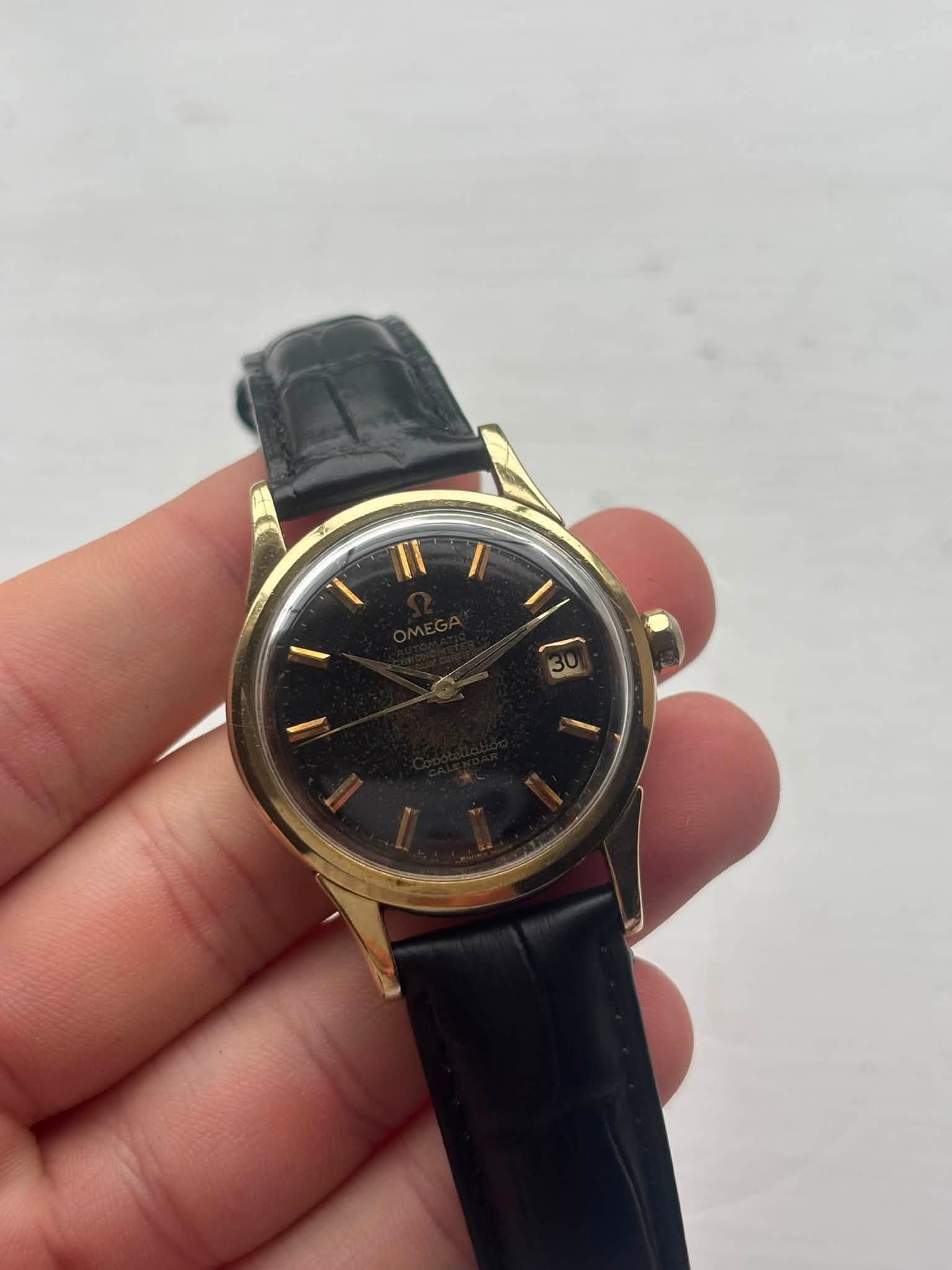May be an image of wrist watch