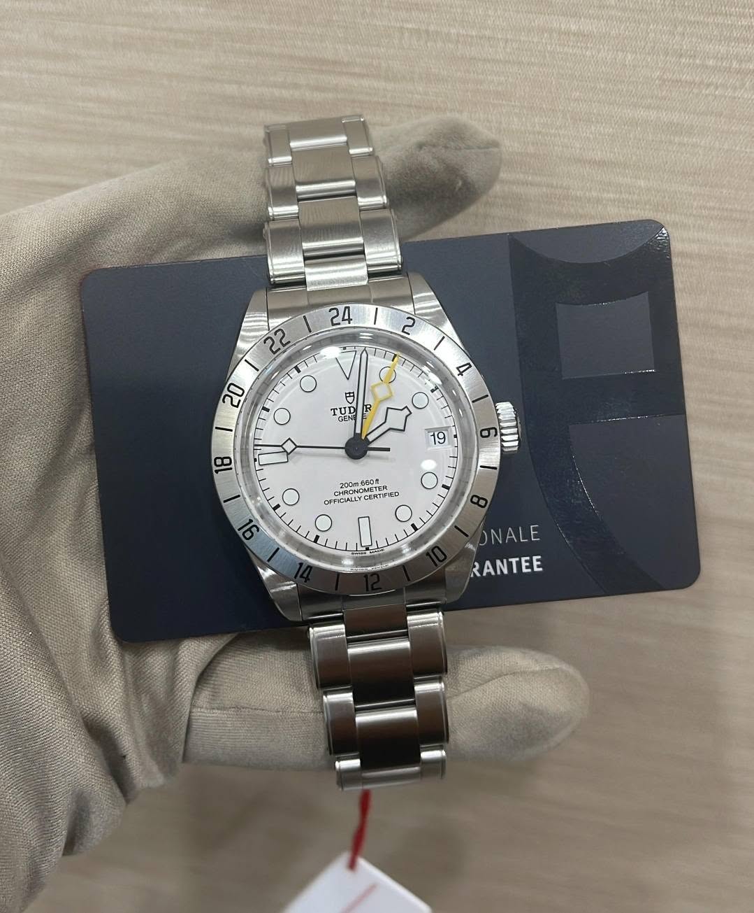 May be an image of wrist watch and text