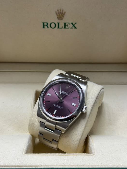 May be an image of wrist watch and text