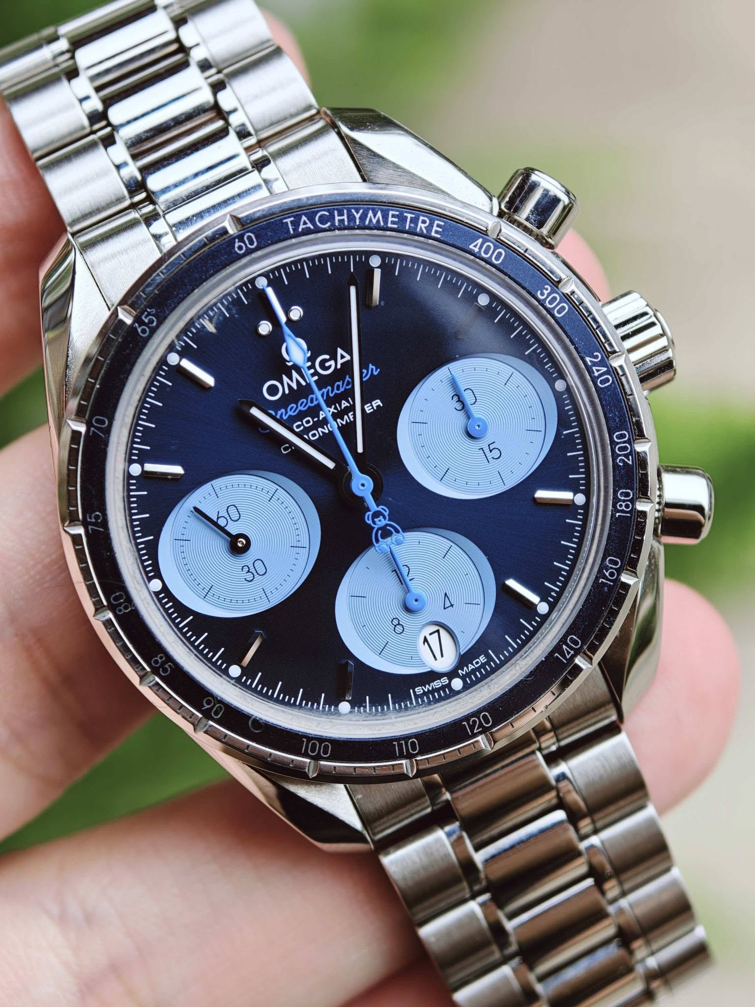 May be an image of wrist watch and text that says '60 TACHYMETRE יוי 65 400 יין' 300 ณ18 240 OMEGA XIAI or necaTa6 nαc CO-A CO- CO ONO MF ER 9 TE 白白清 포 0 15 o 200 三 إل 30…