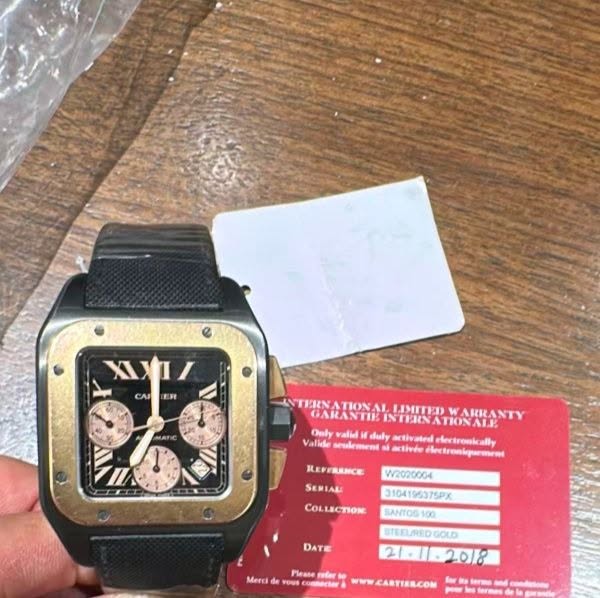 May be an image of digital watch and text