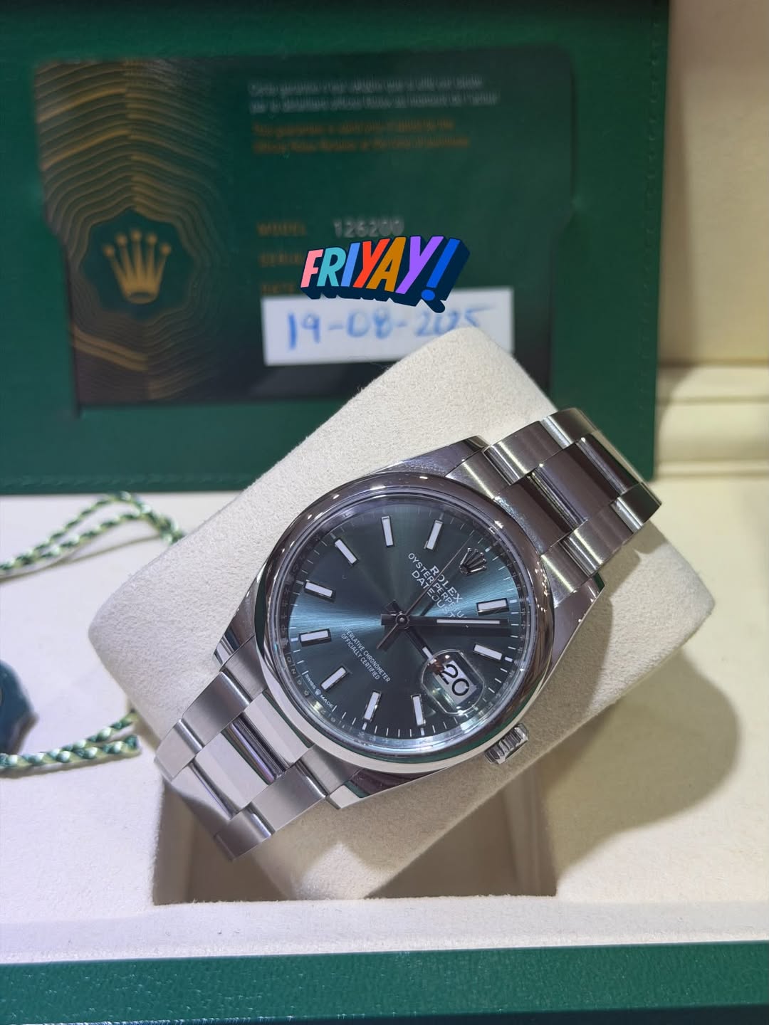 May be an image of wrist watch and text