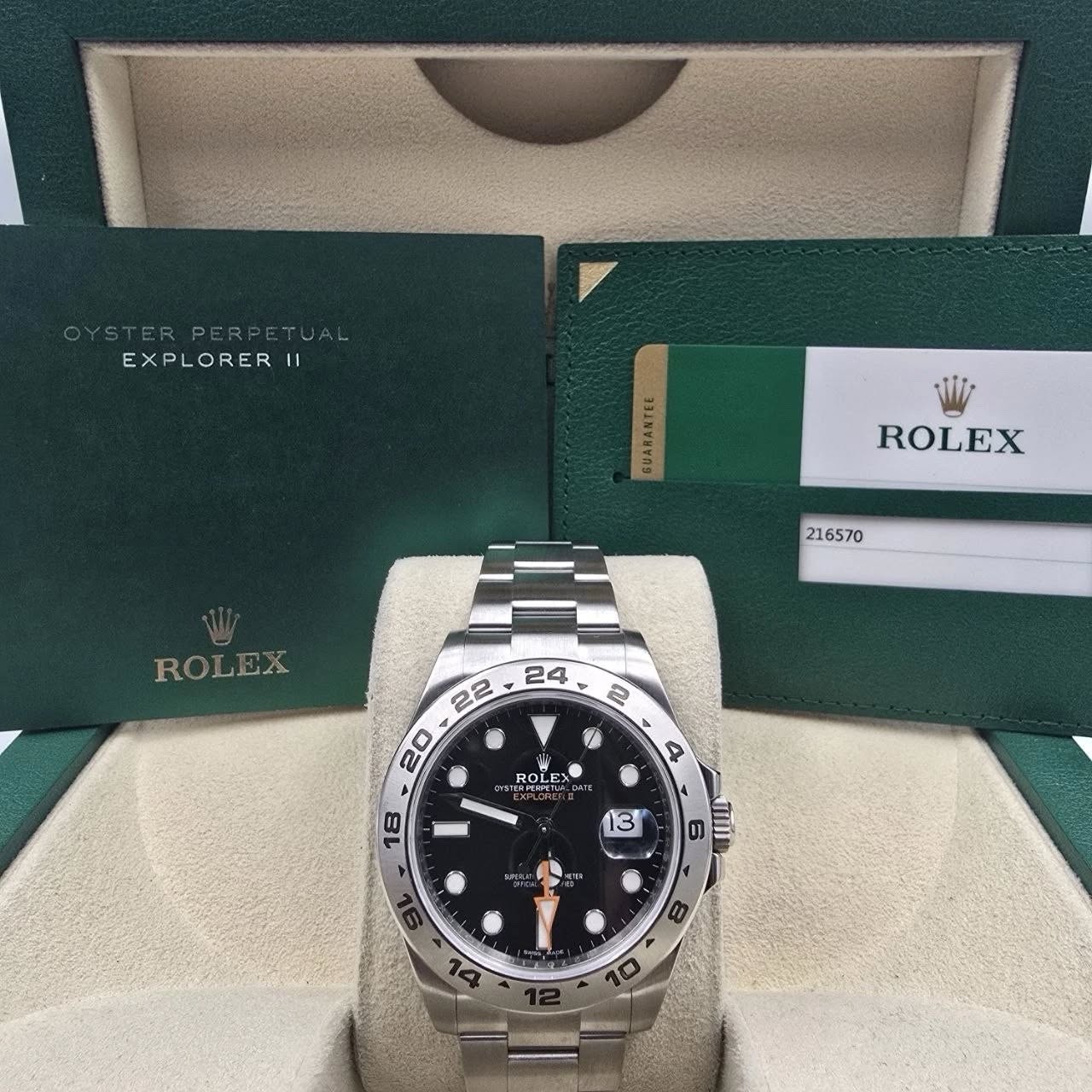 May be an image of wrist watch and text that says 'EXPLORER 11 GUARANTEE ROLEX 216570 ROLEX ROEA GATE ROLE മമ ាុមា レ 8 ٠ O0 Ον 0'