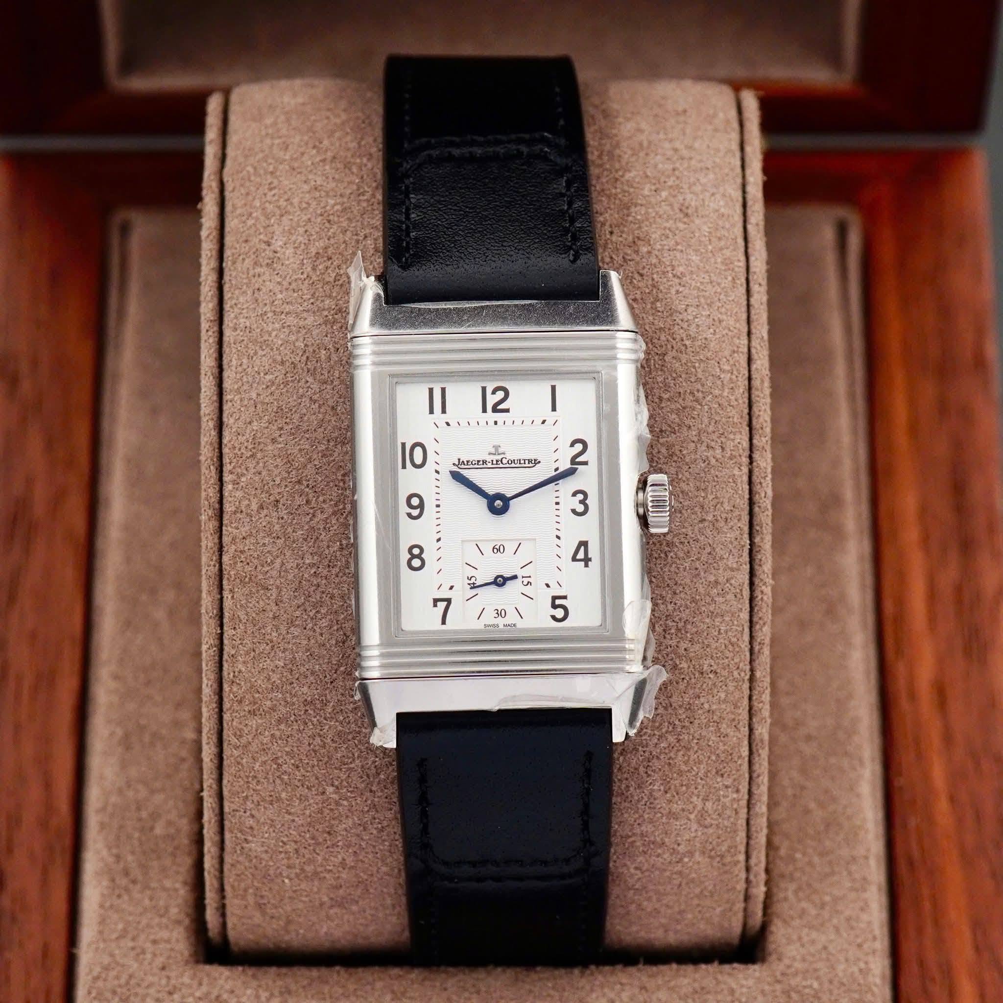 May be an image of wrist watch, timer and text