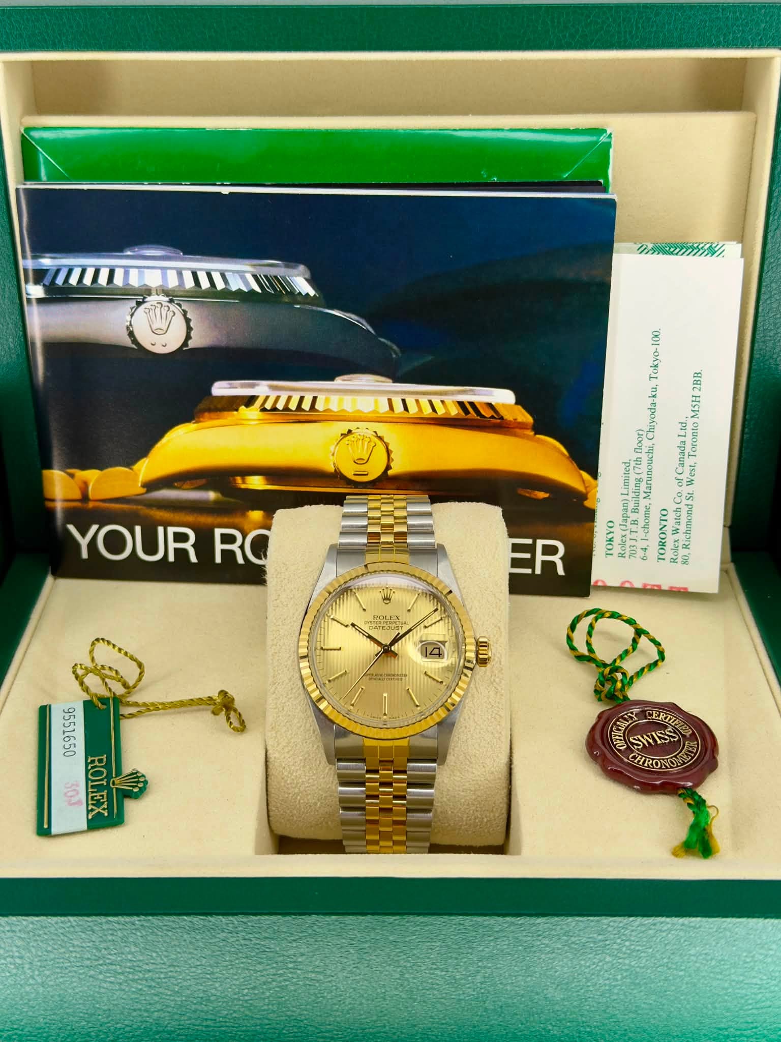 May be an image of wrist watch and text